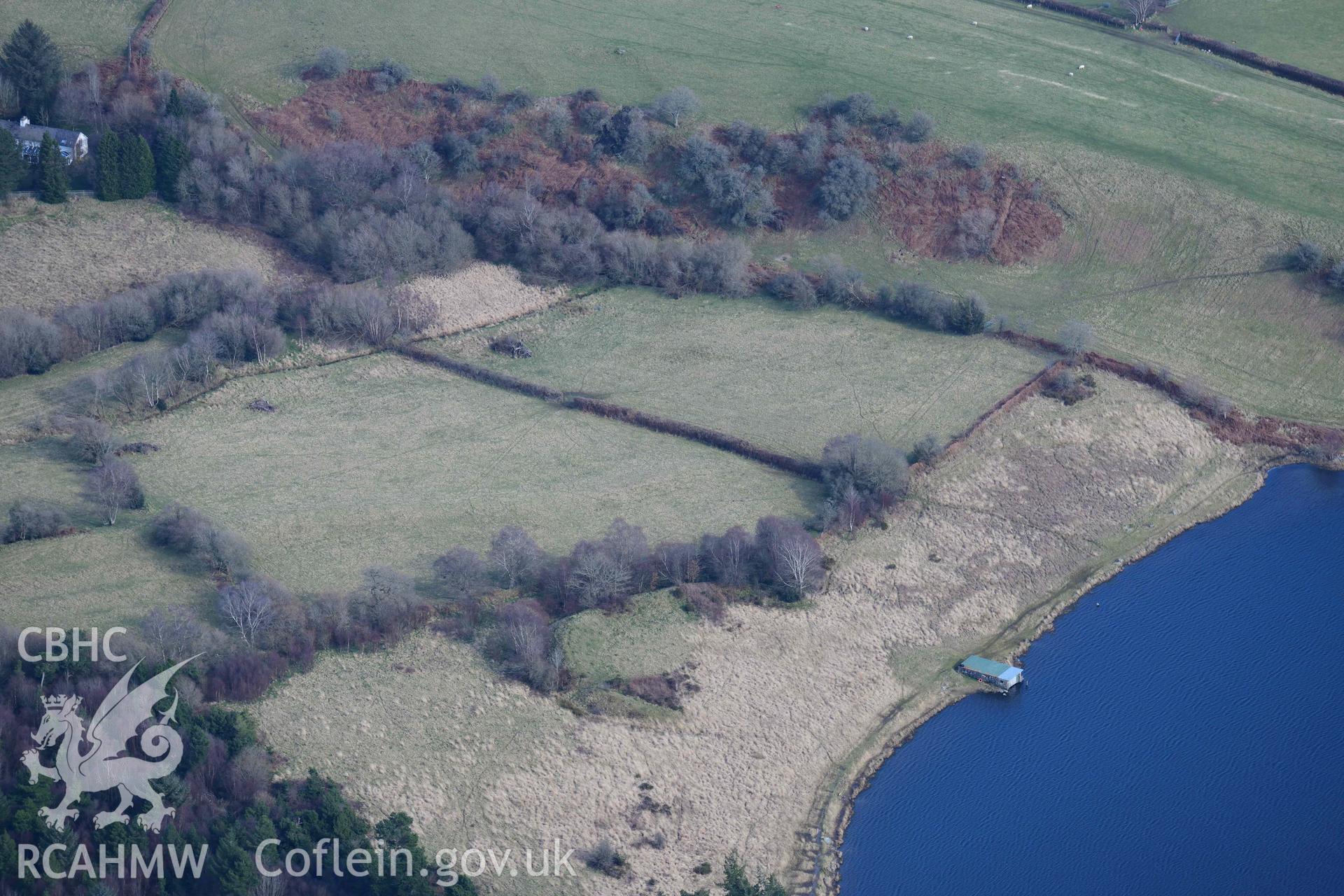 Llyn Gwyn enclosure. Oblique aerial photograph taken during the Royal Commission’s programme of archaeological aerial reconnaissance by Toby Driver on 14 March 2022.
