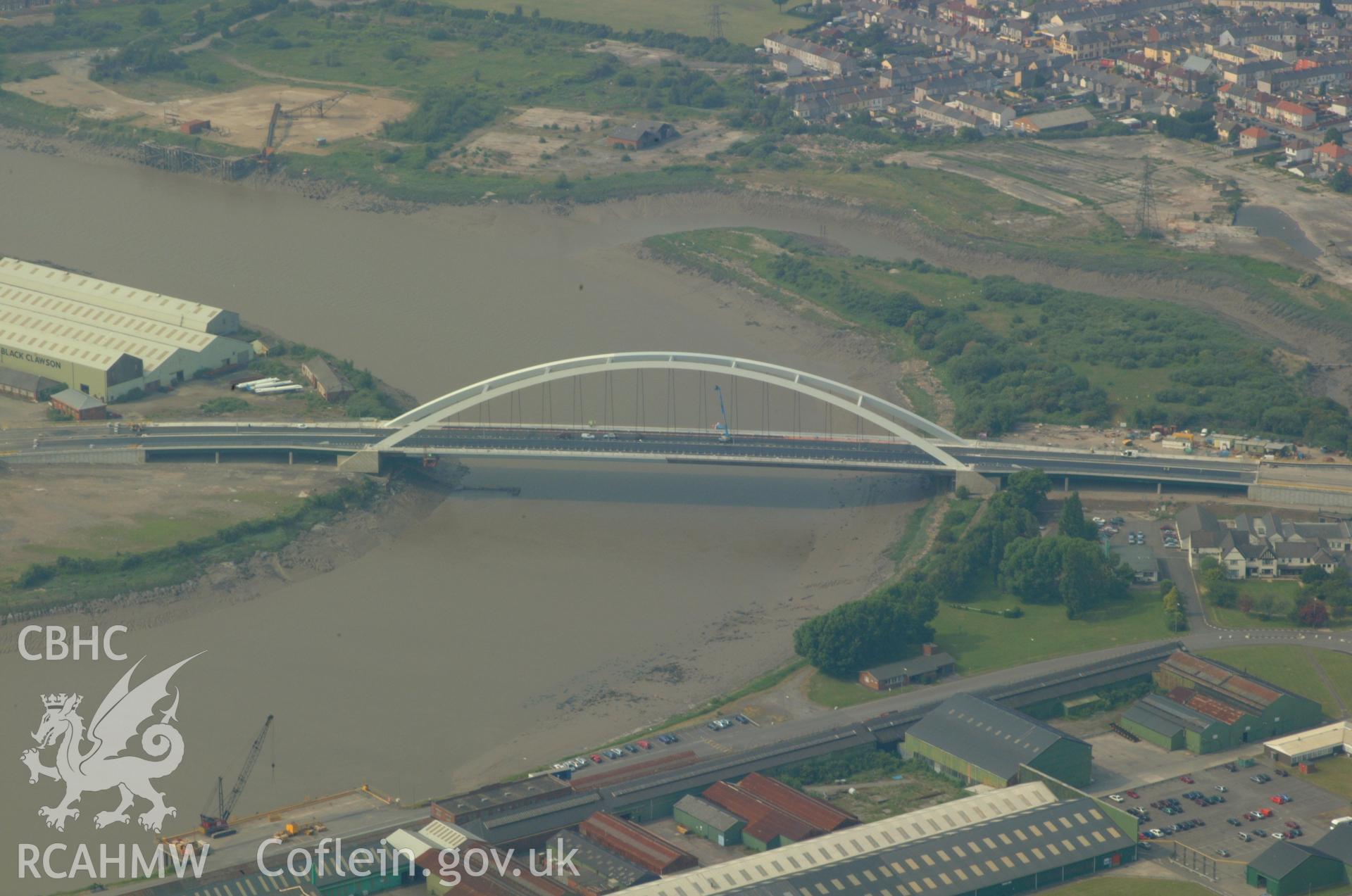RCAHMW colour oblique aerial photograph of Newport Docks, New Bridge. Taken on 26 May 2004 by Toby Driver