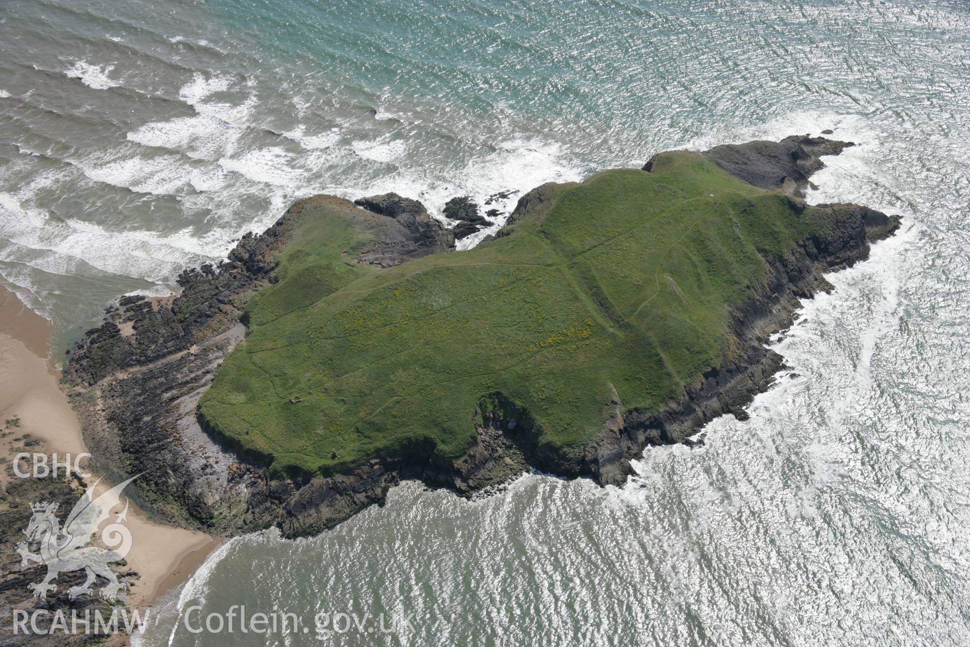 RCAHMW colour oblique aerial photograph of Burry Holms Promontory Fort. Taken on 11 July 2006 by Toby Driver.