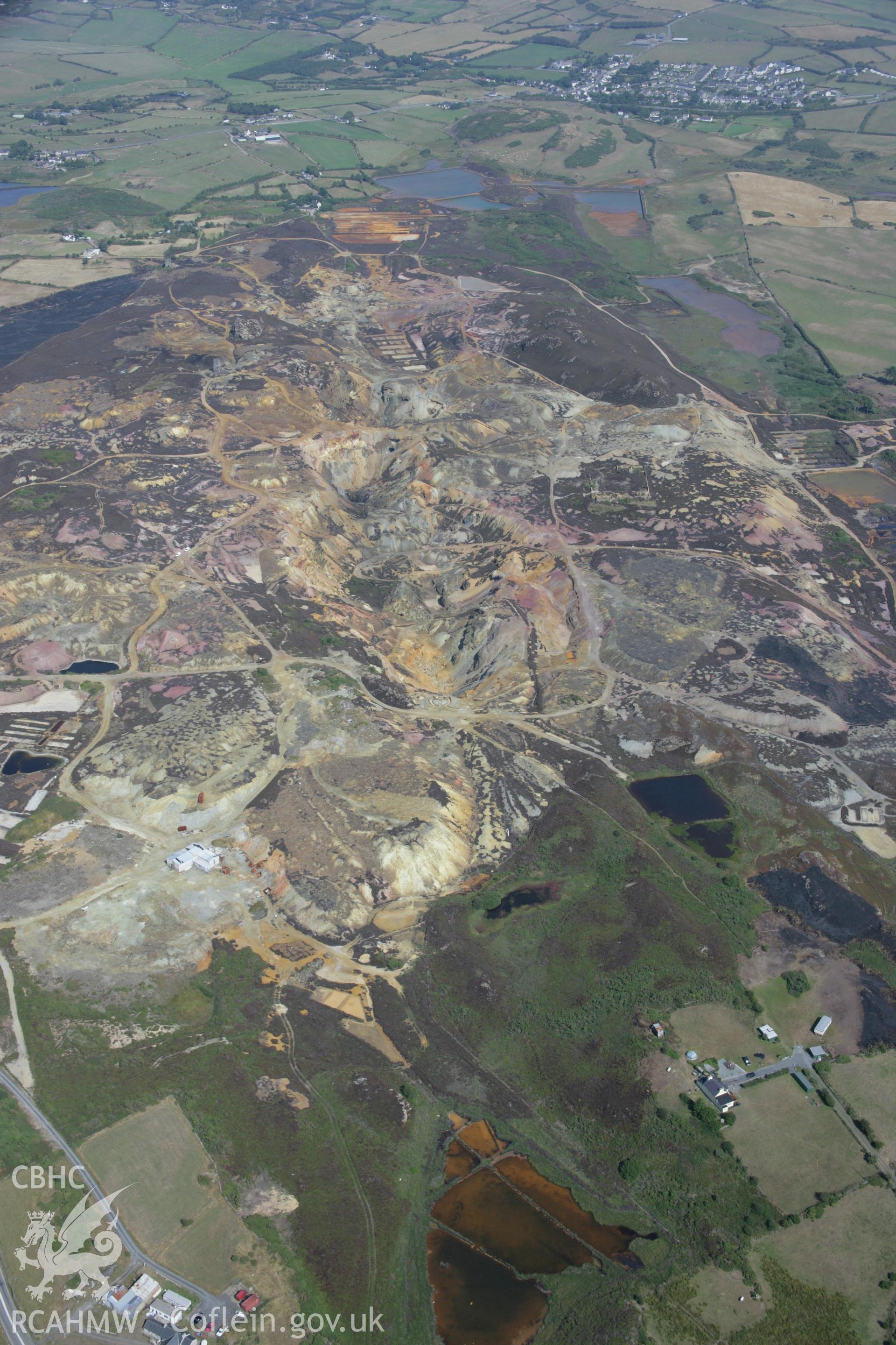 RCAHMW colour oblique aerial photograph of Parys Mountain Copper Mines, Amlwch. Taken on 14 August 2006 by Toby Driver.
