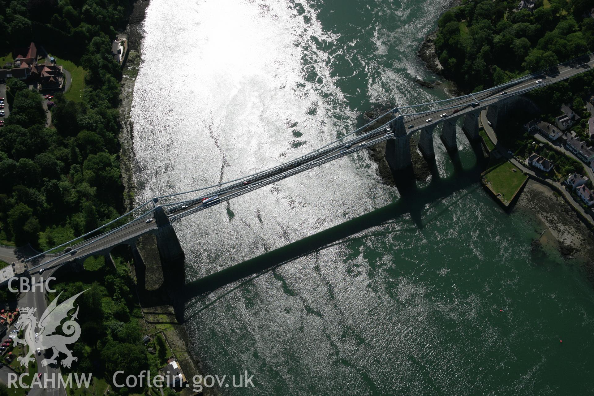 RCAHMW colour oblique aerial photograph of Menai Suspension Bridge. Taken on 14 June 2006 by Toby Driver.