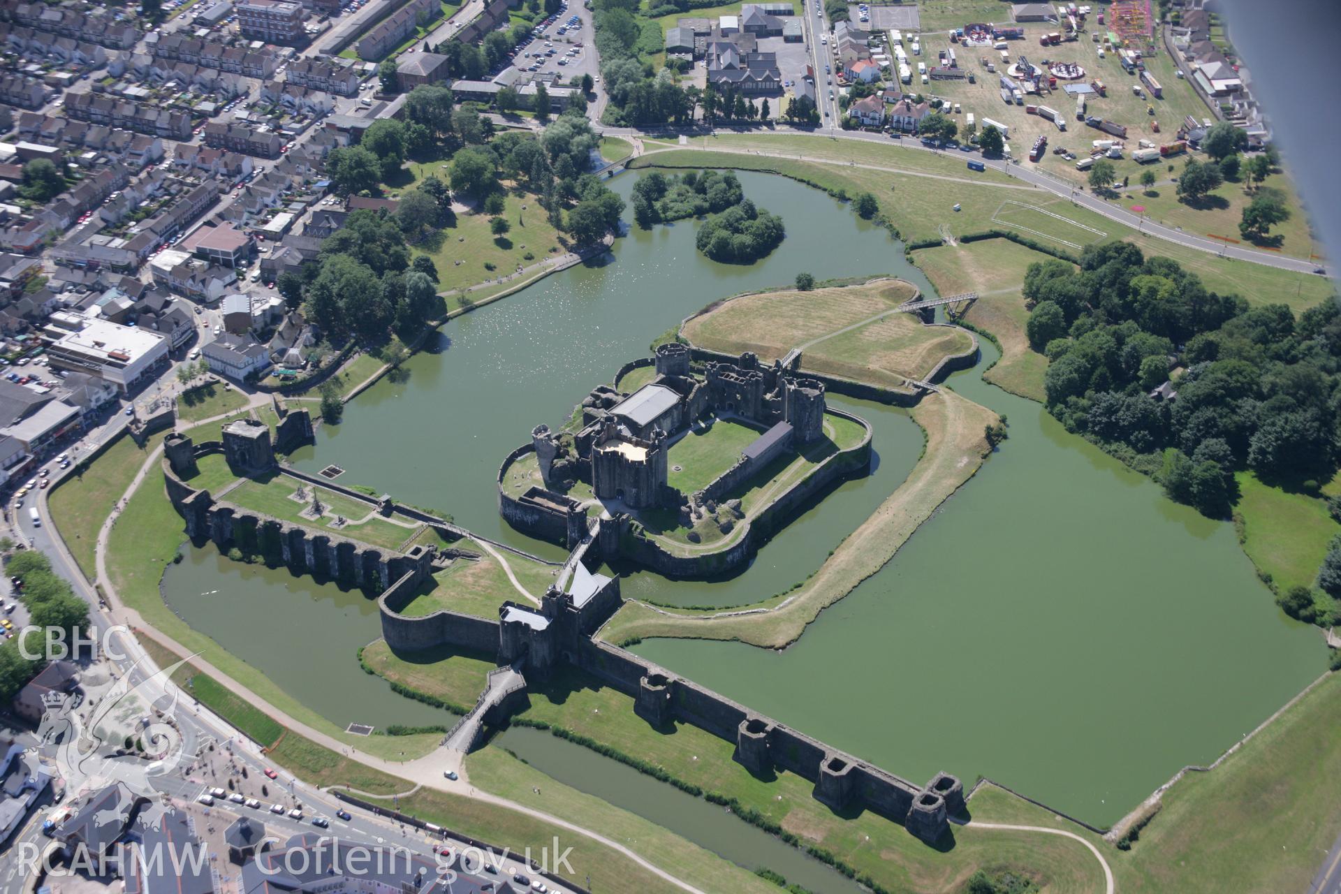 RCAHMW colour oblique aerial photograph of Caerphilly Castle. Taken on 24 July 2006 by Toby Driver.