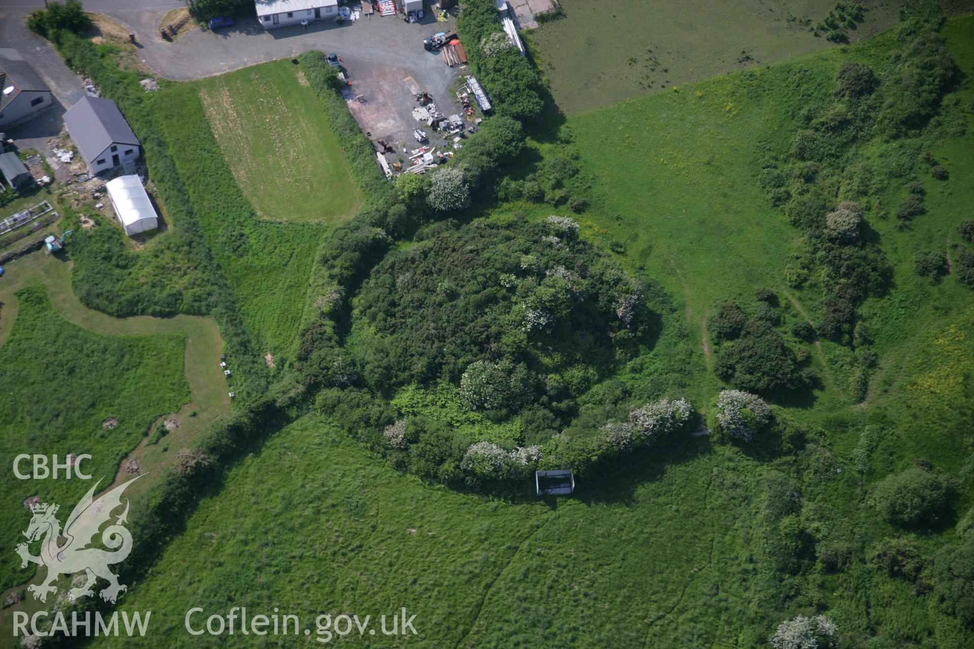 RCAHMW colour oblique aerial photograph of St Ishmael's Tump, from the south. Taken on 08 June 2006 by Toby Driver.