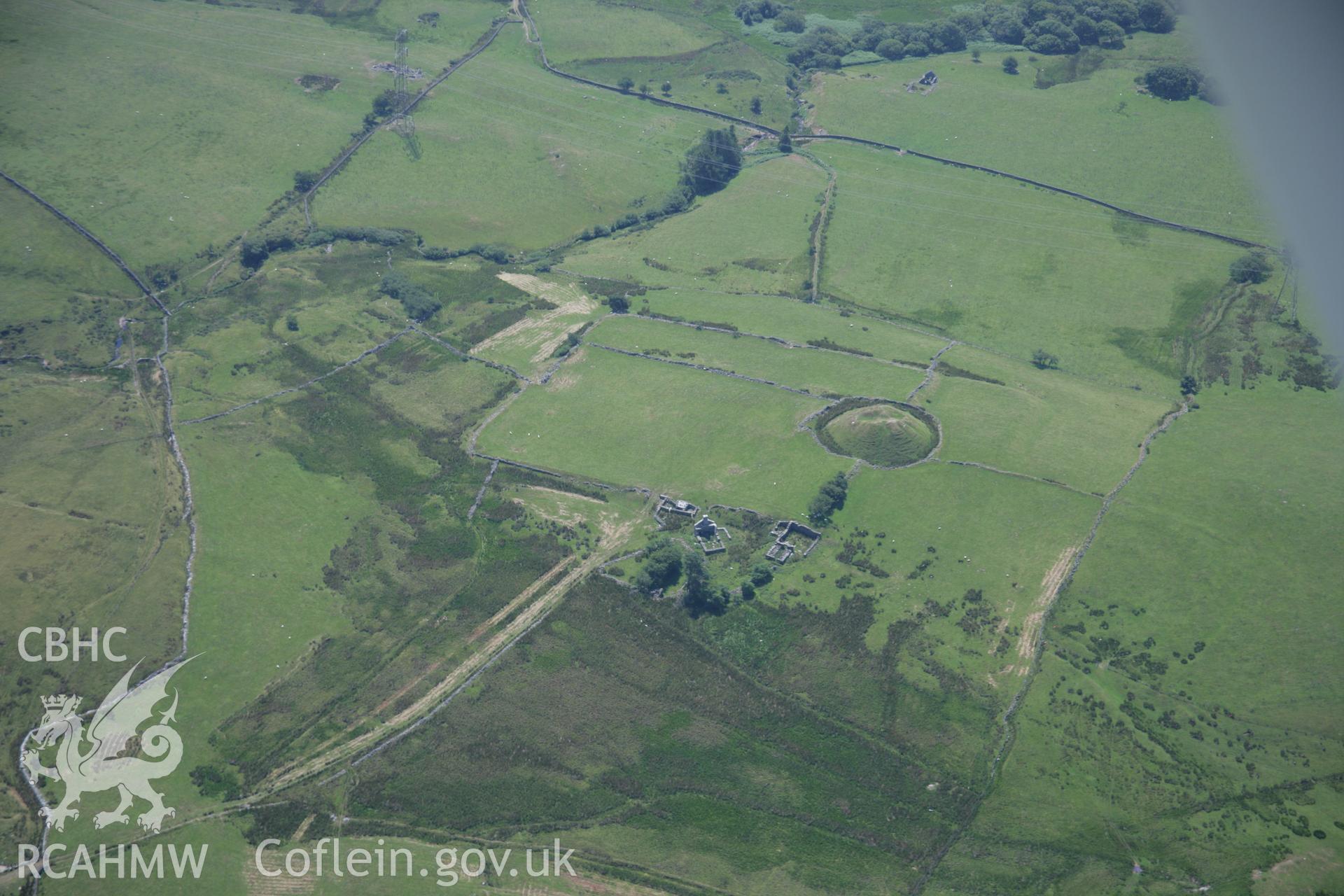 RCAHMW colour oblique aerial photograph of Tomen y Mur Roman Military Settlement. Taken on 18 July 2006 by Toby Driver.