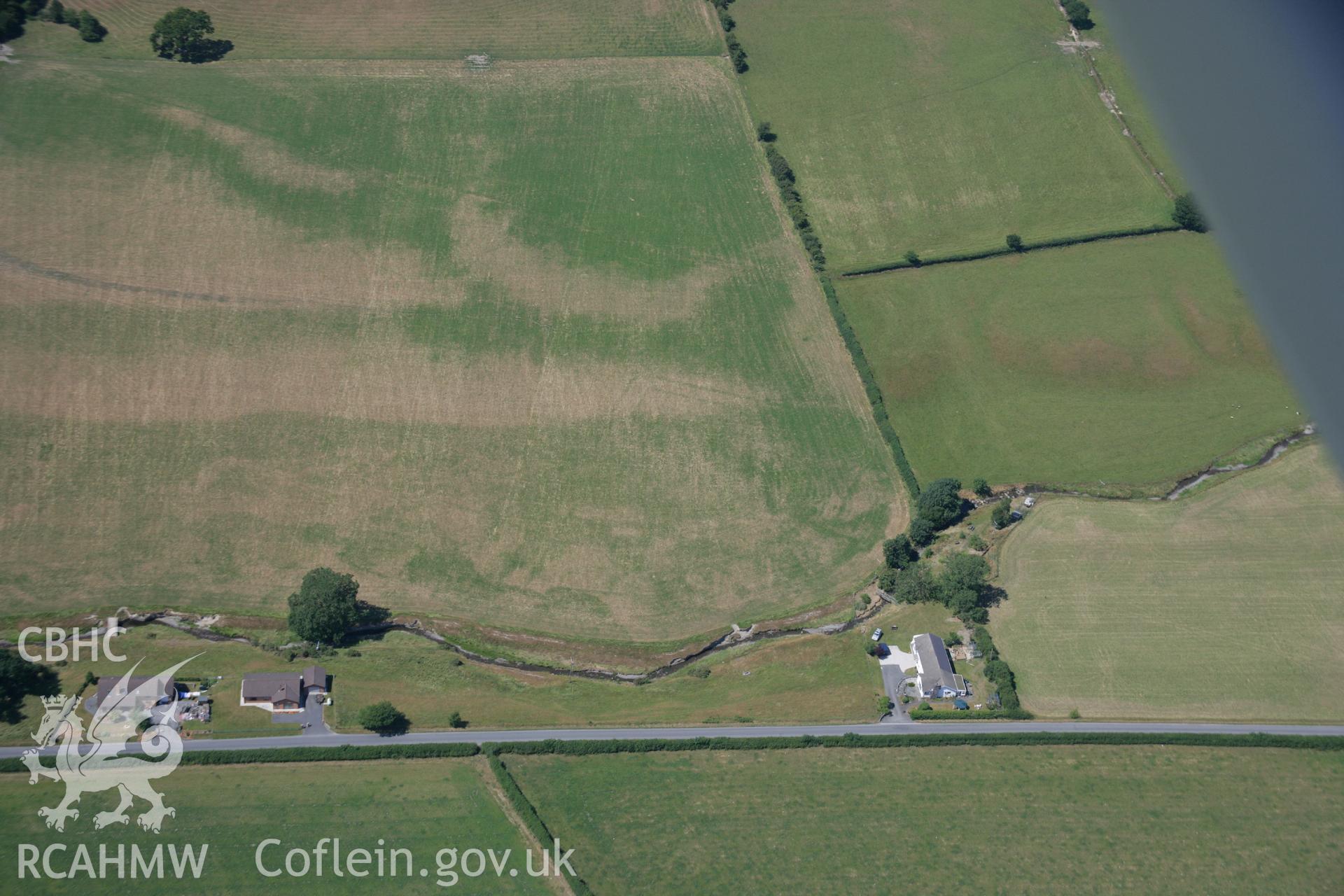 RCAHMW colour oblique aerial photograph of the possible Roman Villa site at Nant Magwr, Abermagwr. Taken on 17 July 2006 by Toby Driver.
