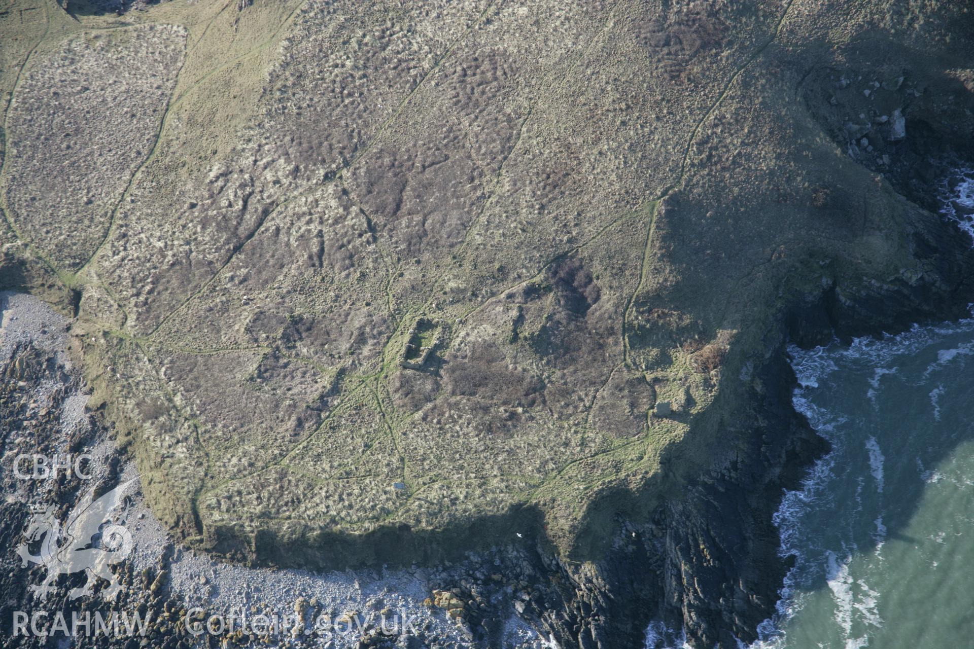 RCAHMW colour oblique aerial photograph of Medieval Hermitage Site on Burry Holms, viewed from the east. Taken on 26 January 2006 by Toby Driver.
