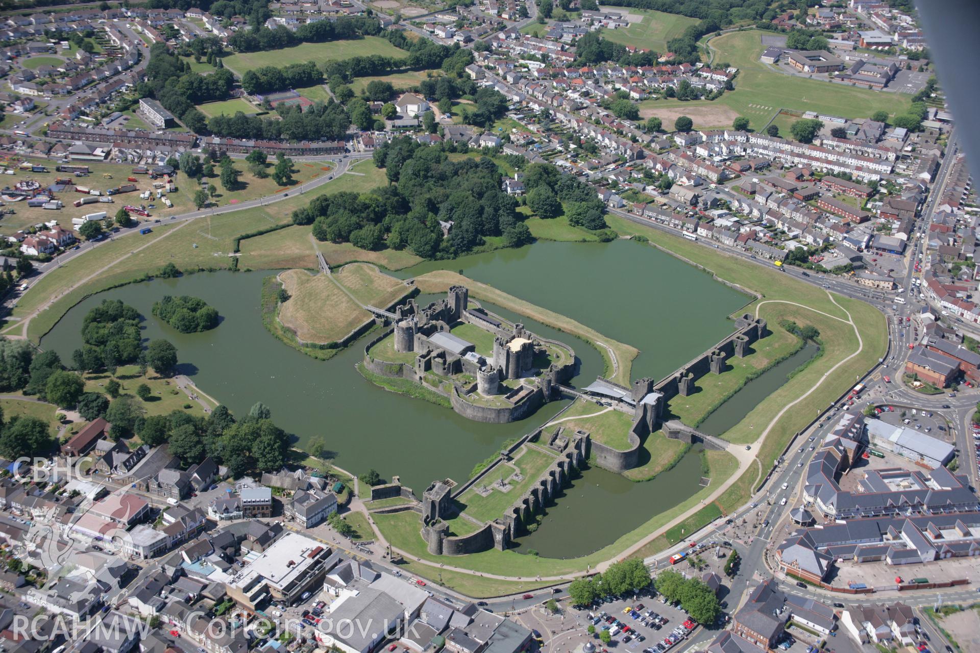RCAHMW colour oblique aerial photograph of Caerphilly Castle. Taken on 24 July 2006 by Toby Driver.