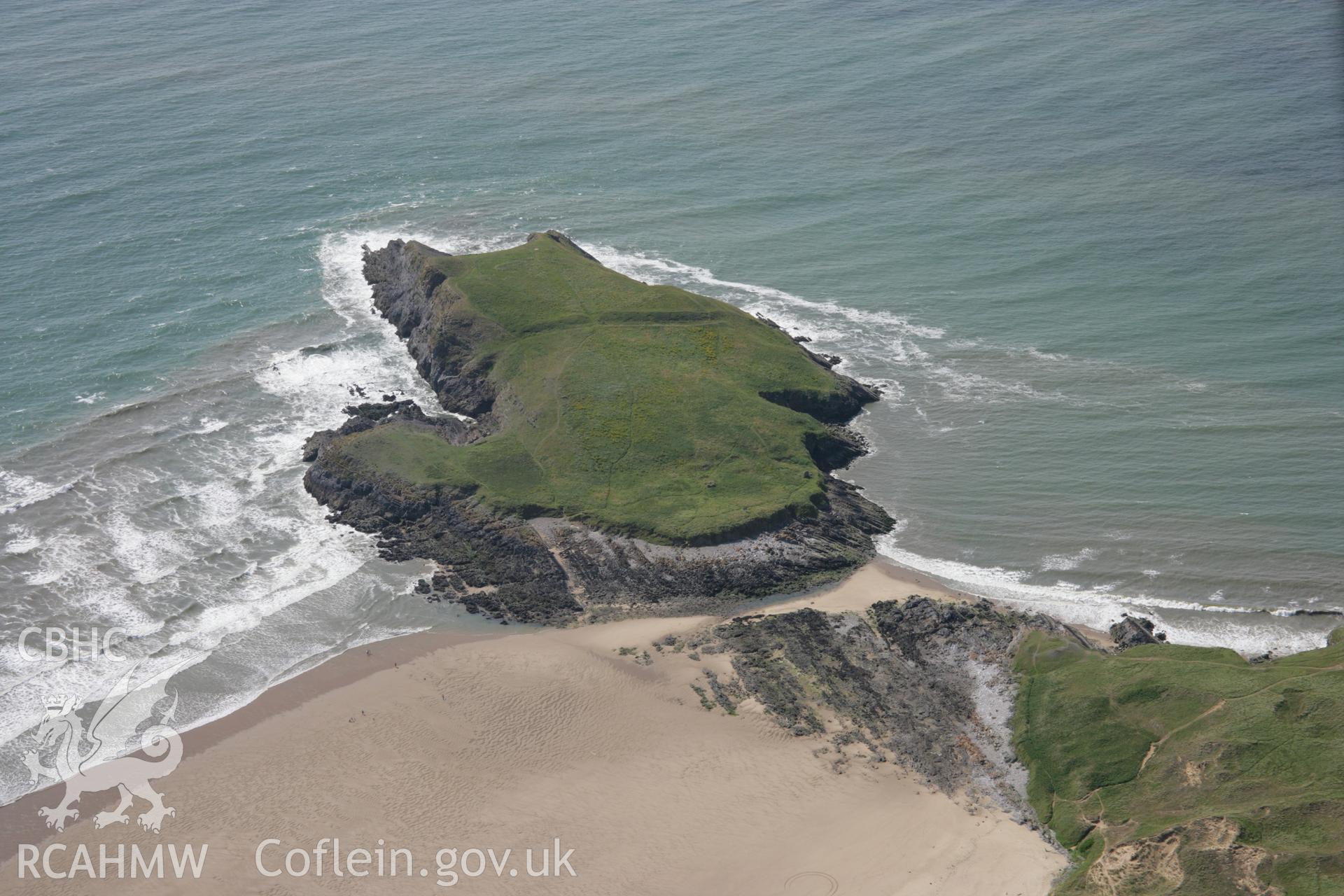 RCAHMW colour oblique aerial photograph of Burry Holms Promontory Fort. Taken on 11 July 2006 by Toby Driver.