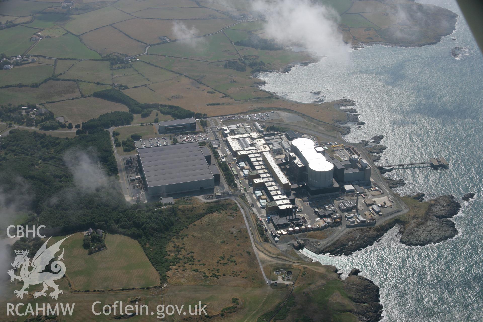 RCAHMW colour oblique aerial photograph of Wylfa Nuclear Power Station. Taken on 14 August 2006 by Toby Driver.