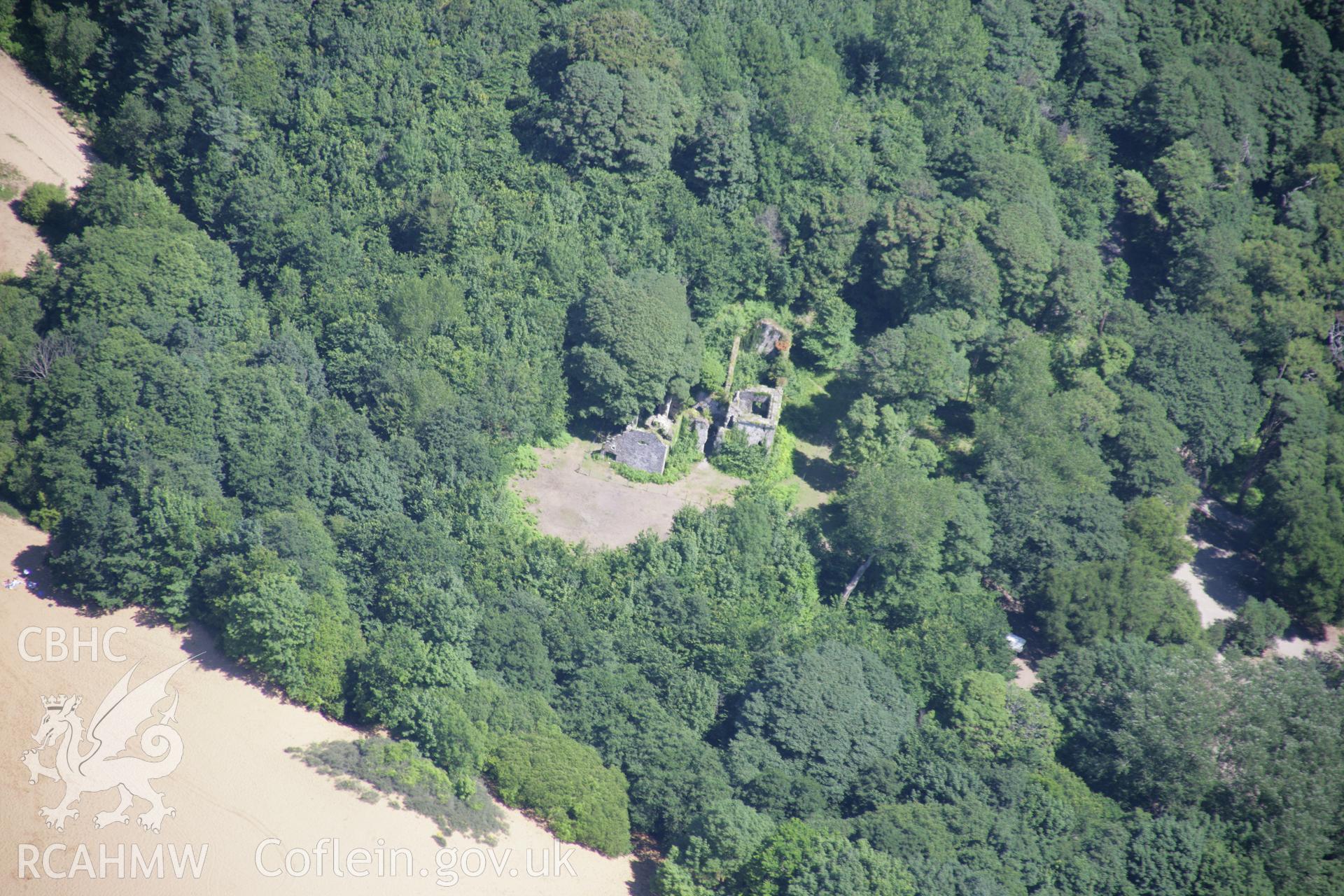 RCAHMW colour oblique aerial photograph of Candleston Castle. Taken on 24 July 2006 by Toby Driver
