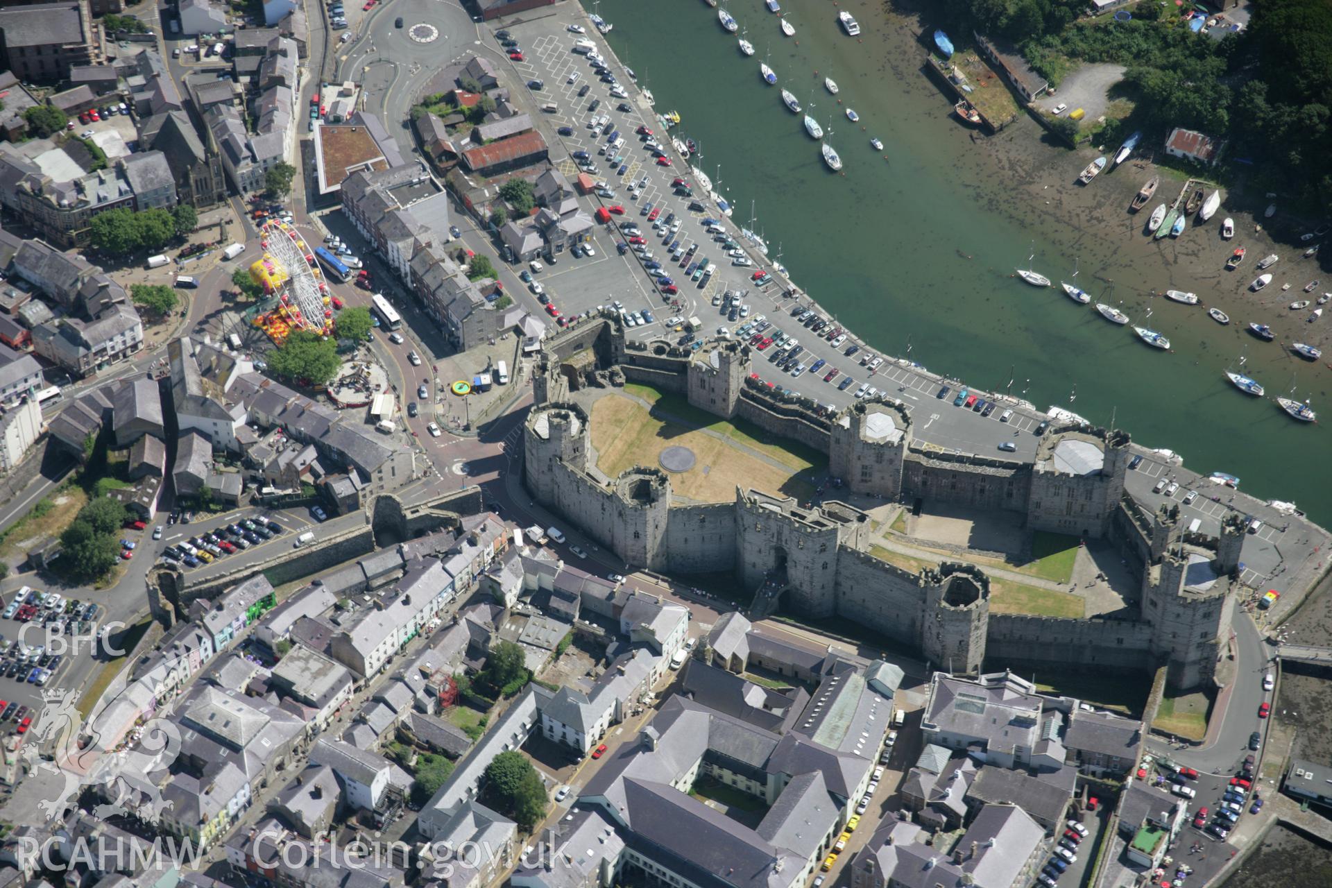 RCAHMW colour oblique aerial photograph of Caernarfon Castle. Taken on 25 July 2006 by Toby Driver.