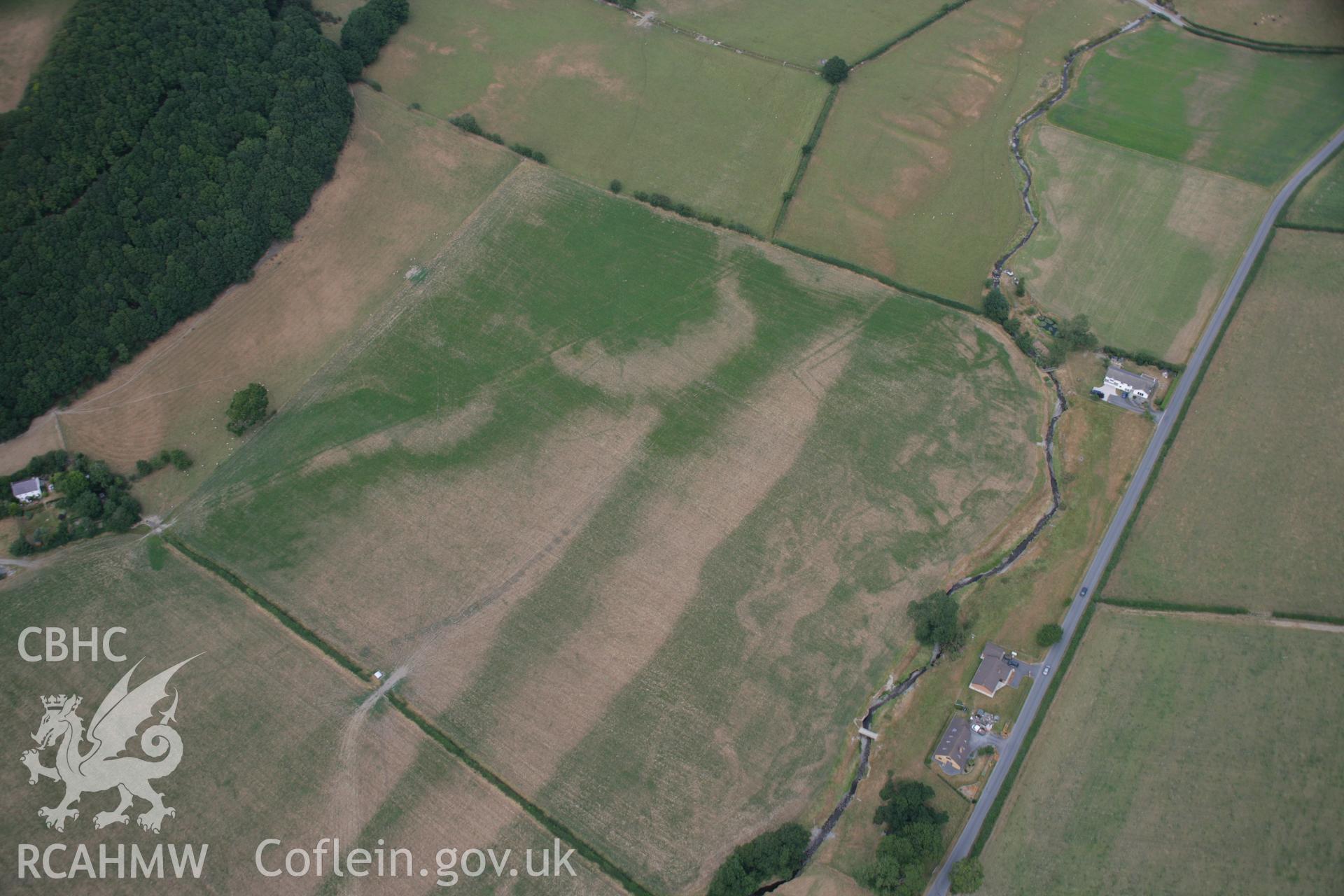 RCAHMW colour oblique aerial photograph of the possible Roman Villa site at Nant Magwr, Abermagwr. Taken on 27 July 2006 by Toby Driver