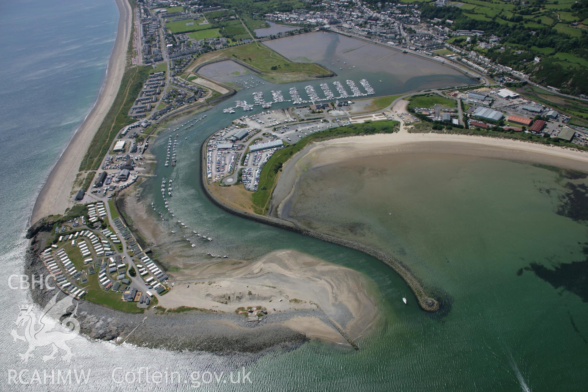 RCAHMW colour oblique aerial photograph of Pwllheli Harbour looking west. Taken on 14 June 2006 by Toby Driver.