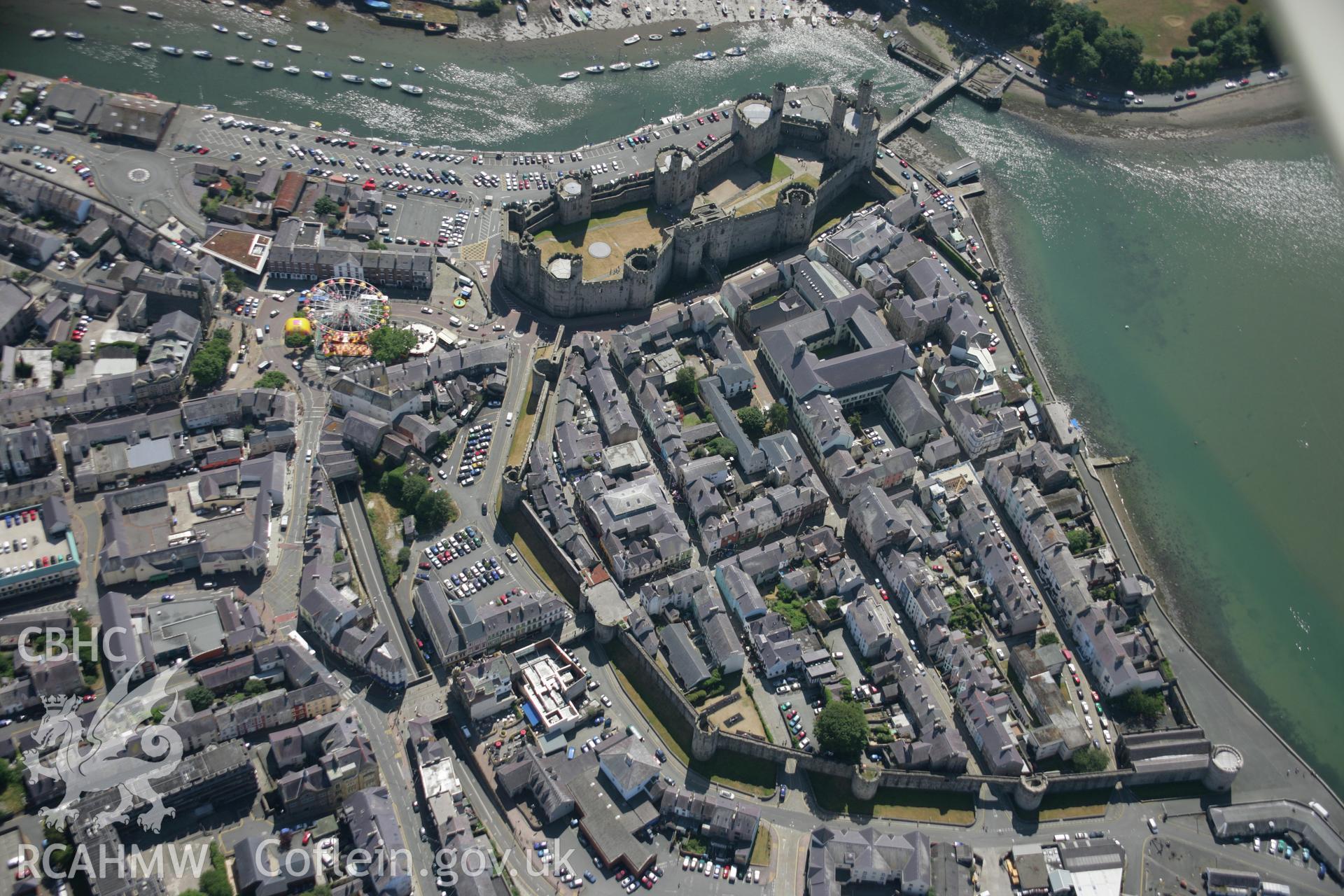 RCAHMW colour oblique aerial photograph of Caernarfon Castle. Taken on 25 July 2006 by Toby Driver.