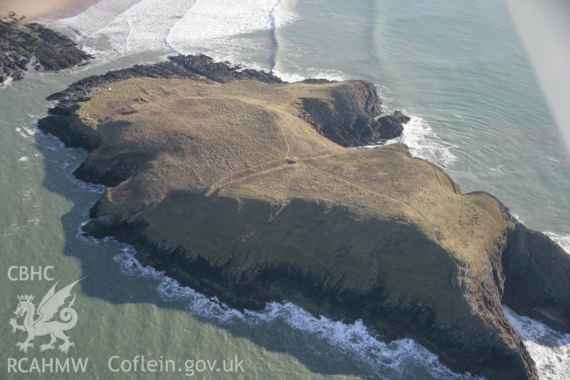 RCAHMW colour oblique aerial photograph of Burry Holms Promontory Fort from the north-west. Taken on 26 January 2006 by Toby Driver.