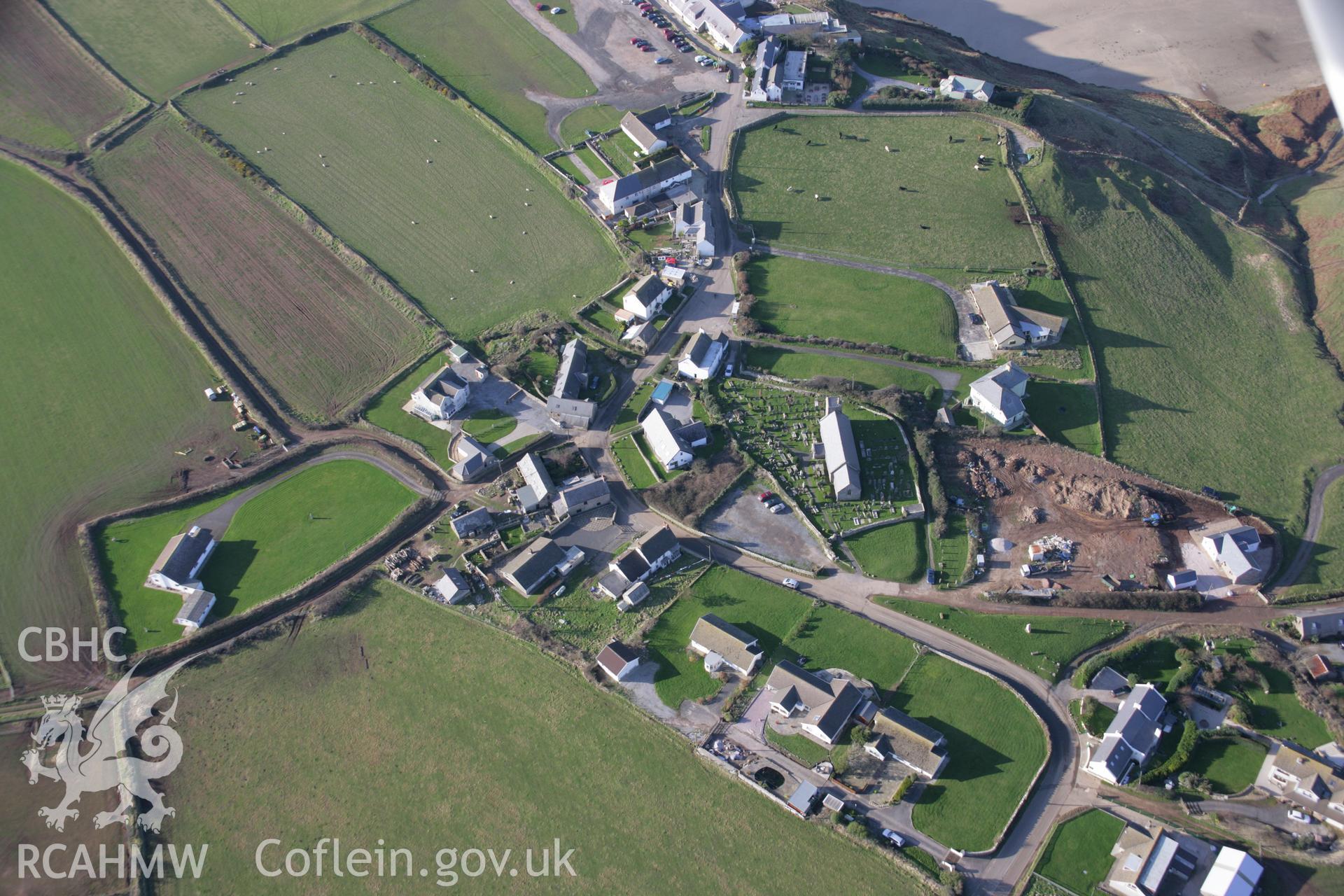 RCAHMW colour oblique aerial photograph of St Mary's Church, Rhossili viewed from the east. Taken on 26 January 2006 by Toby Driver