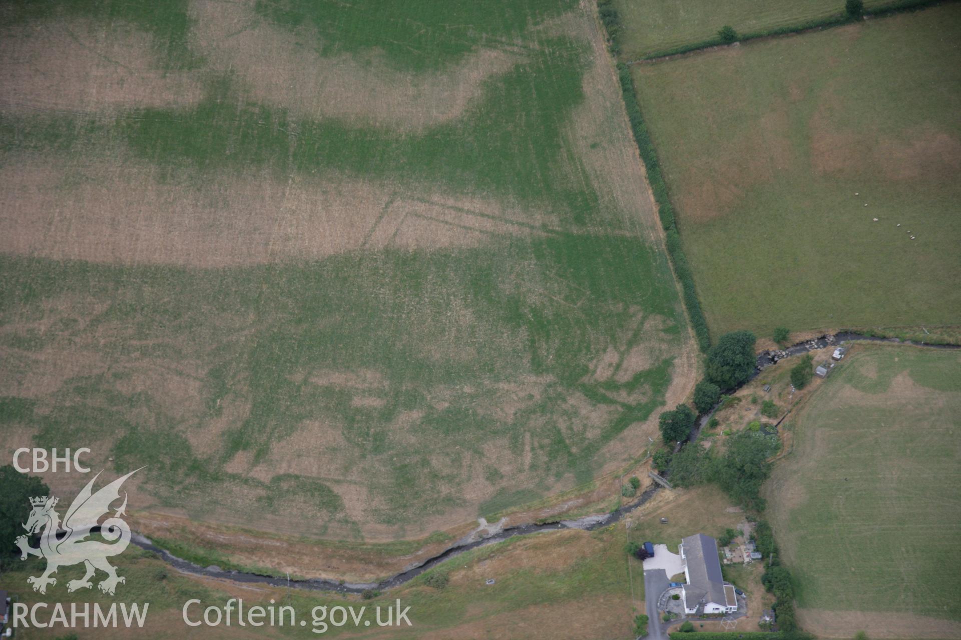 RCAHMW colour oblique aerial photograph of the possible Roman Villa site at Nant Magwr, Abermagwr. Taken on 27 July 2006 by Toby Driver