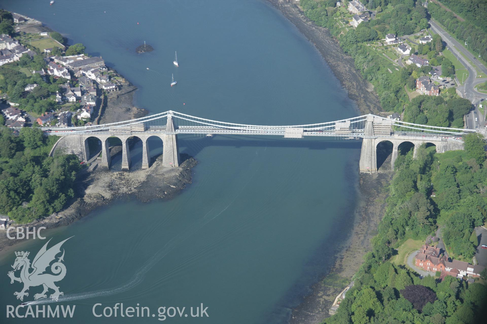 RCAHMW digital colour oblique photograph of Menai Suspension Bridge viewed from the south-west. Taken on 08/06/2005 by T.G. Driver.