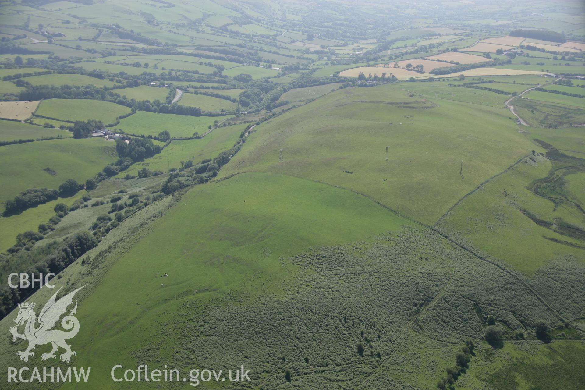 RCAHMW colour oblique aerial photograph of braided trackways ascending the fort at Gaer Fawr from the east. Taken on 23 June 2005 by Toby Driver