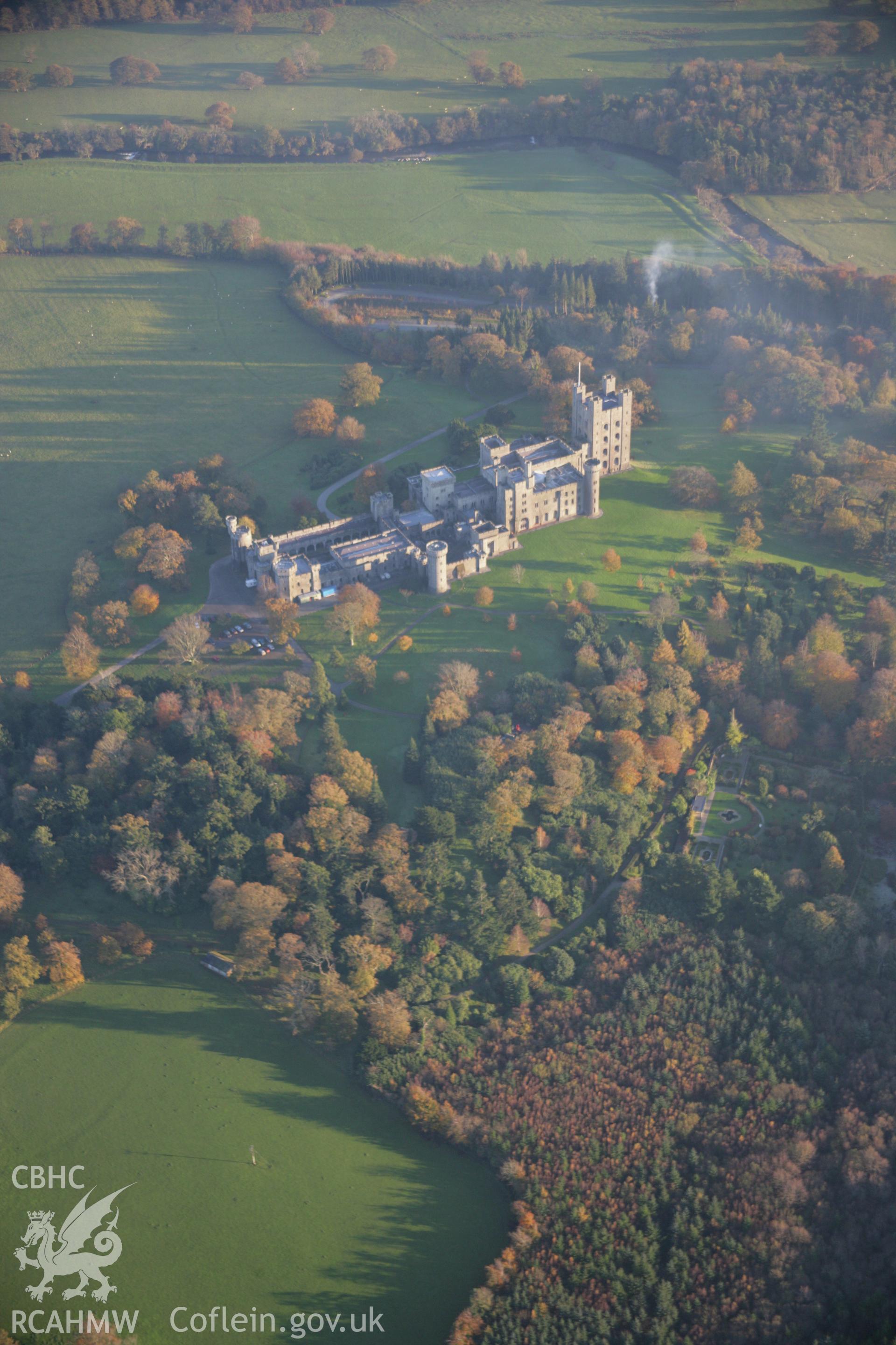 RCAHMW colour oblique aerial photograph of Penrhyn Castle, Bangor, in general view from the north-west. Taken on 21 November 2005 by Toby Driver