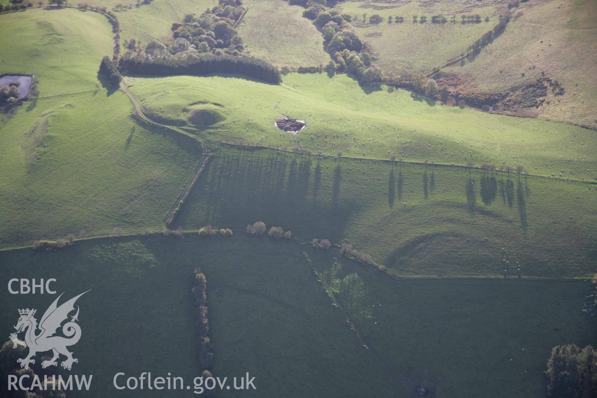 RCAHMW colour oblique aerial photograph of Tomen Bedd-Ugre from the north. Taken on 13 October 2005 by Toby Driver