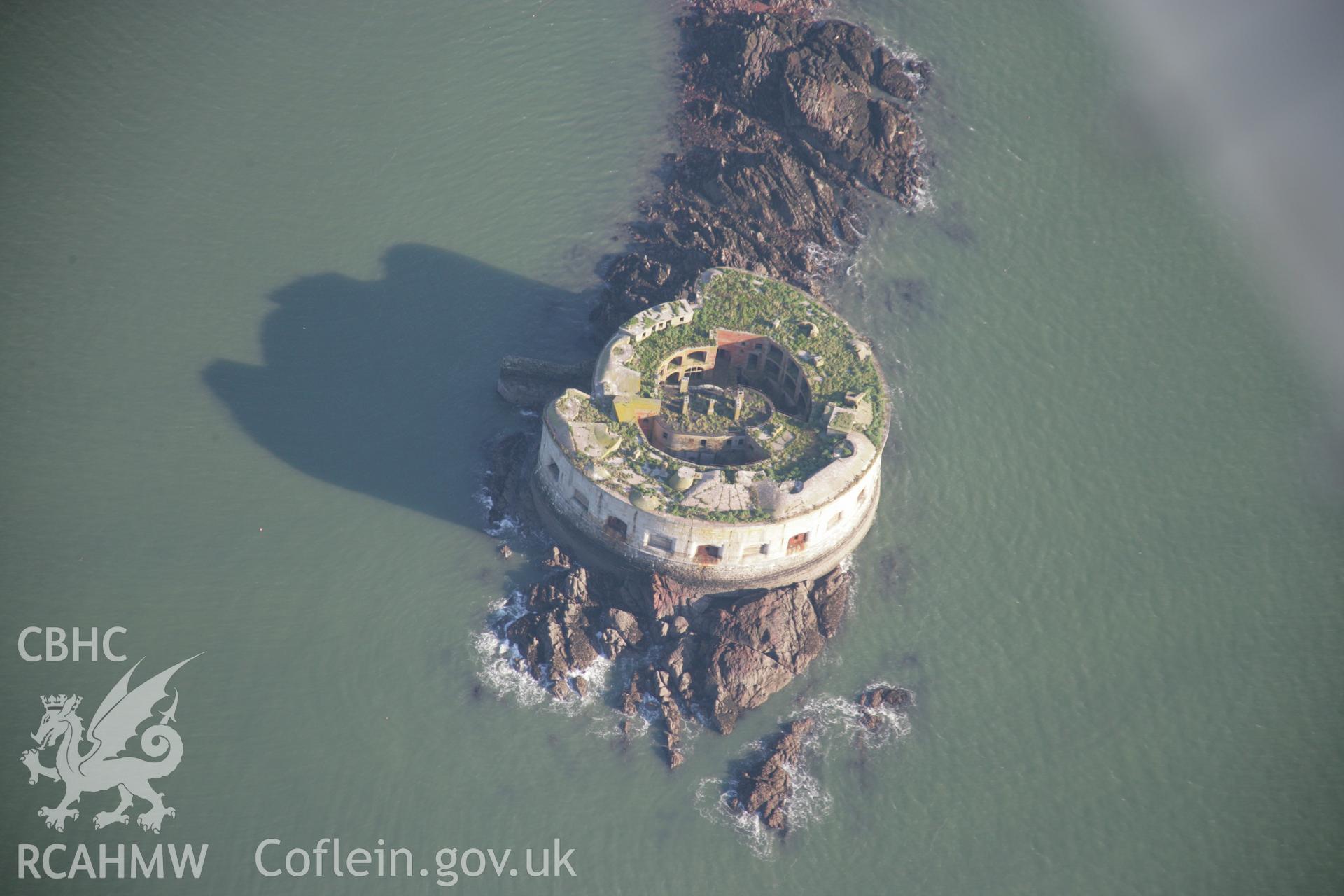 RCAHMW colour oblique aerial photograph of Stack Rock Fort from the west. Taken on 19 November 2005 by Toby Driver
