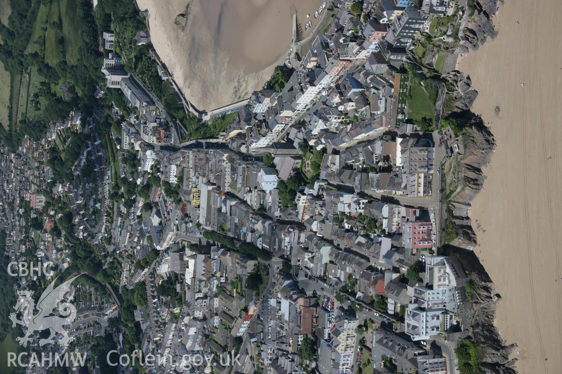 RCAHMW colour oblique aerial photograph of Tenby showing the town and its walls from the south-east. Taken on 22 June 2005 by Toby Driver