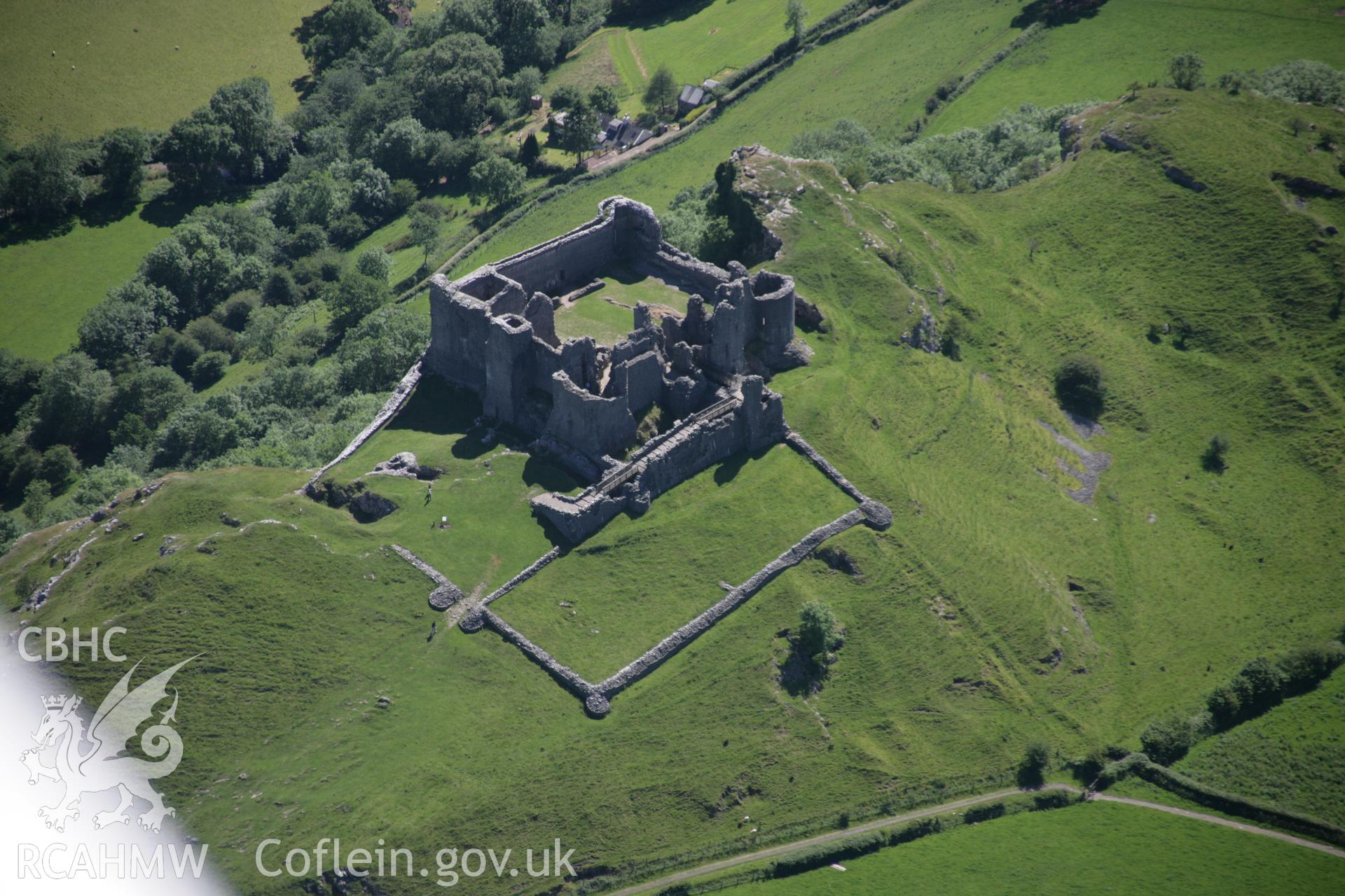 RCAHMW colour oblique aerial photograph of Carreg Cennen Castle from the north-east. Taken on 22 June 2005 by Toby Driver