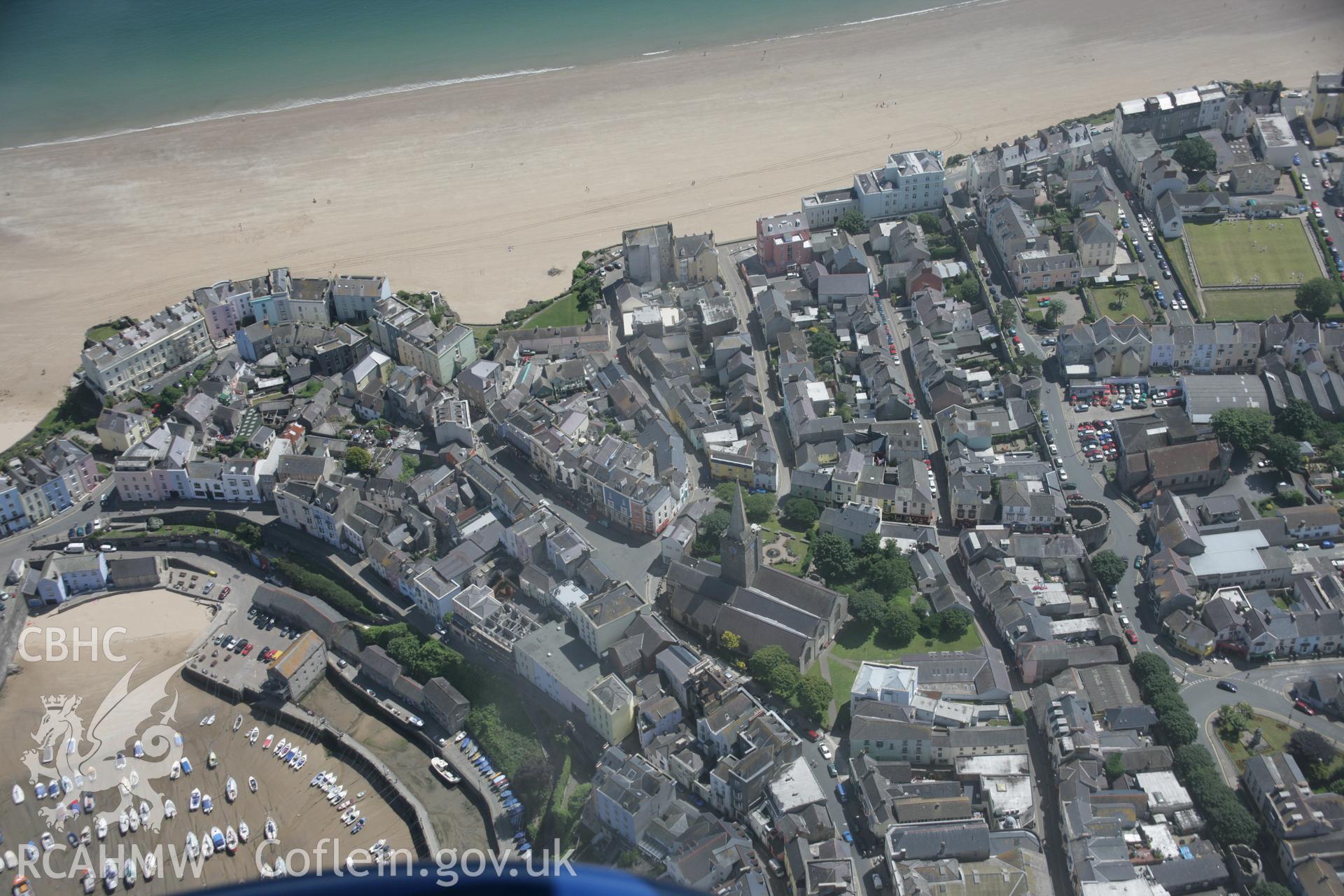 RCAHMW colour oblique aerial photograph of Tenby from the north showing the town and its walls. Taken on 22 June 2005 by Toby Driver