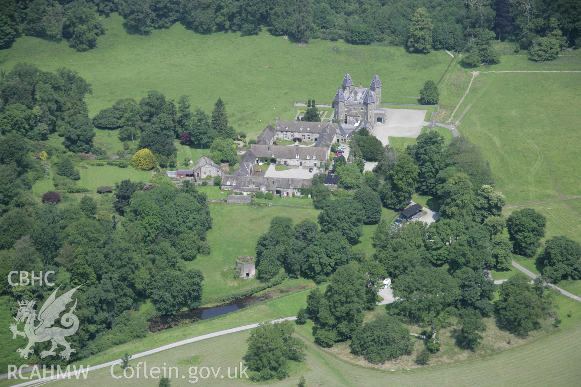 RCAHMW colour oblique aerial photograph of Newton House, (Dinefwr Castle), Llandeilo, in general view from the south. Taken on 11 July 2005 by Toby Driver