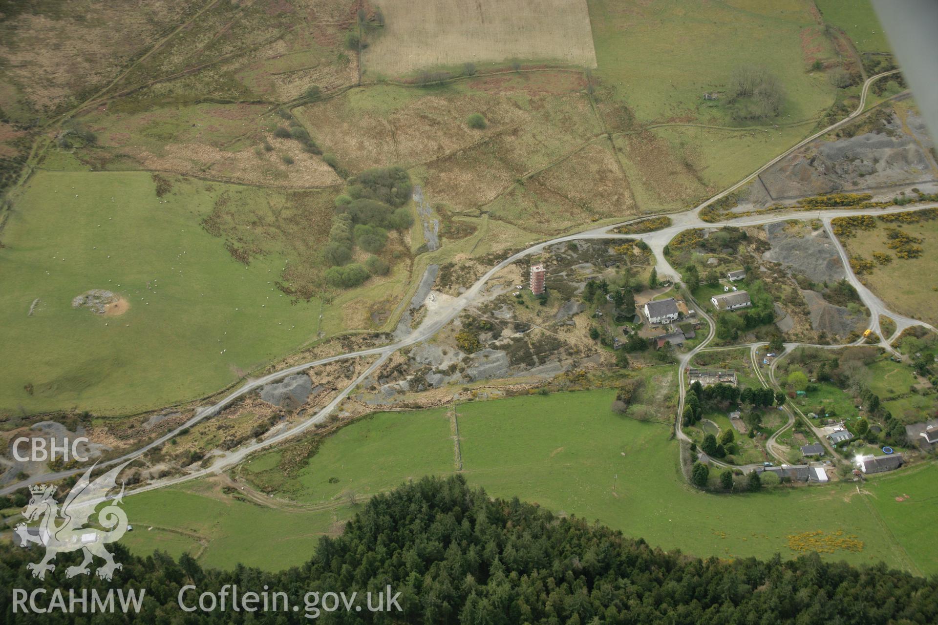 RCAHMW colour oblique aerial photograph of Cwmsymlog Lead Mine. Taken on 17 April 2007 by Toby Driver