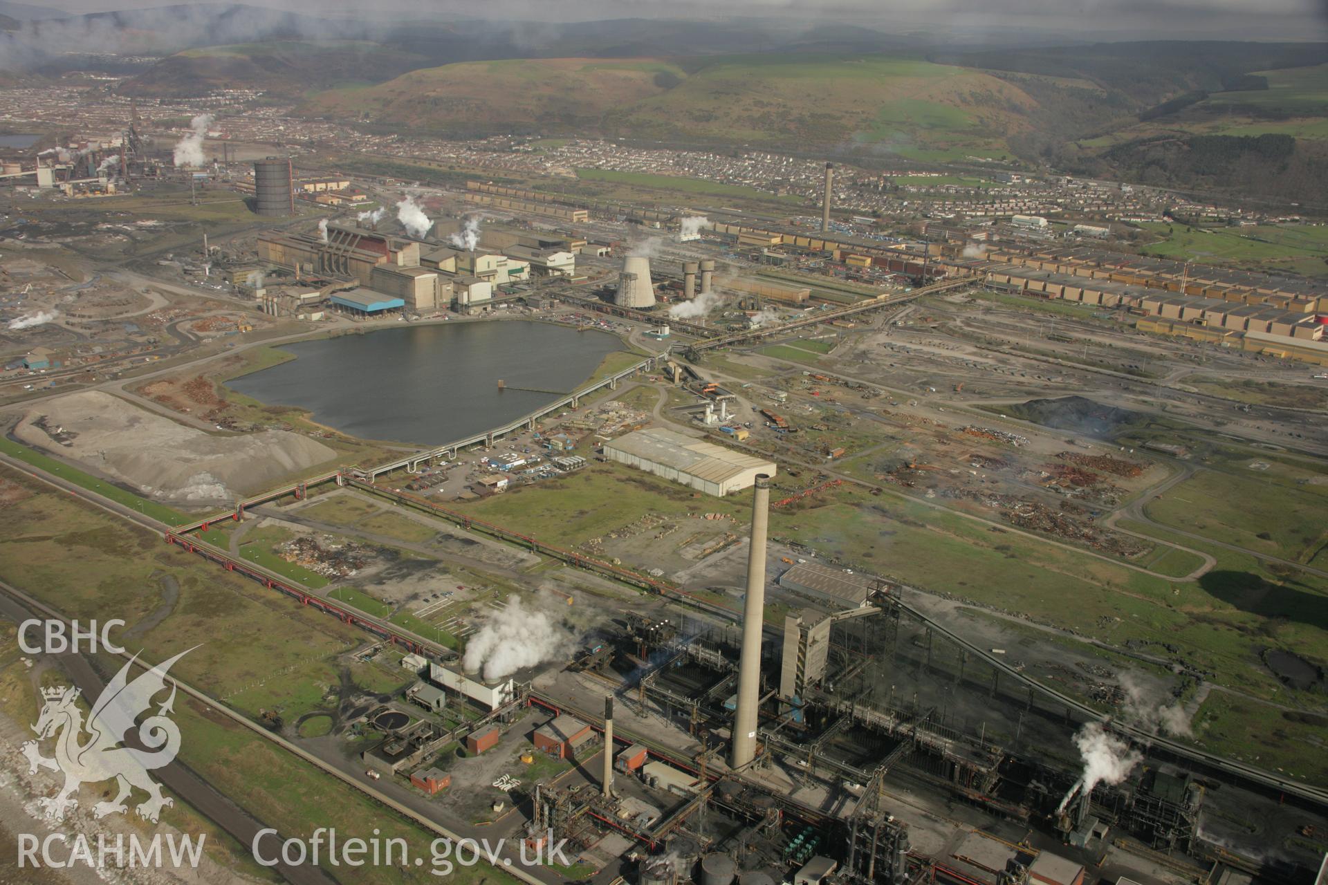 RCAHMW colour oblique aerial photograph of Abbey Works, Margam Steel Works, Margam. Taken on 16 March 2007 by Toby Driver