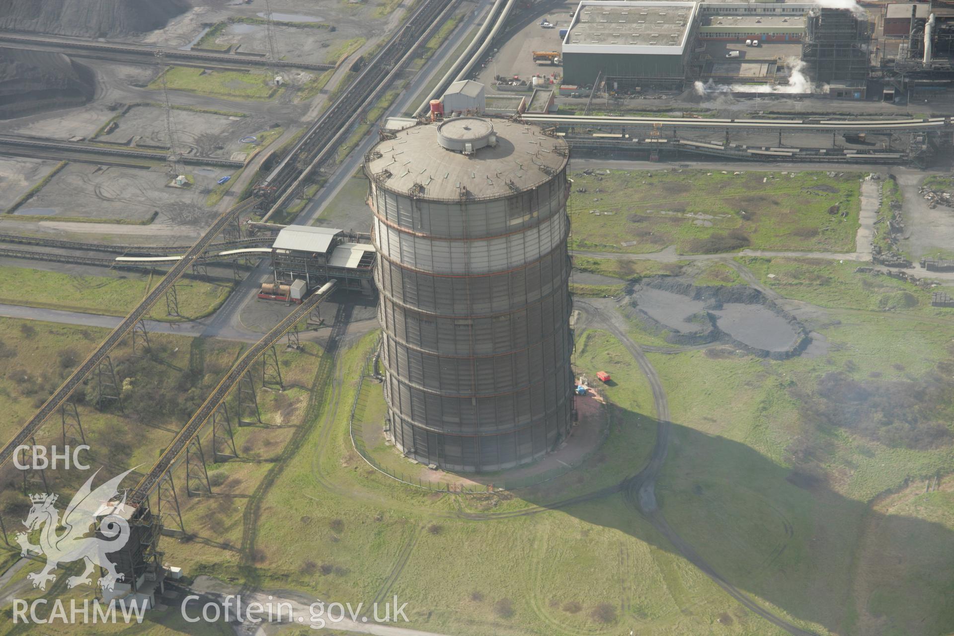 RCAHMW colour oblique aerial photograph of Abbey Works, Margam Steel Works, Margam. Taken on 16 March 2007 by Toby Driver