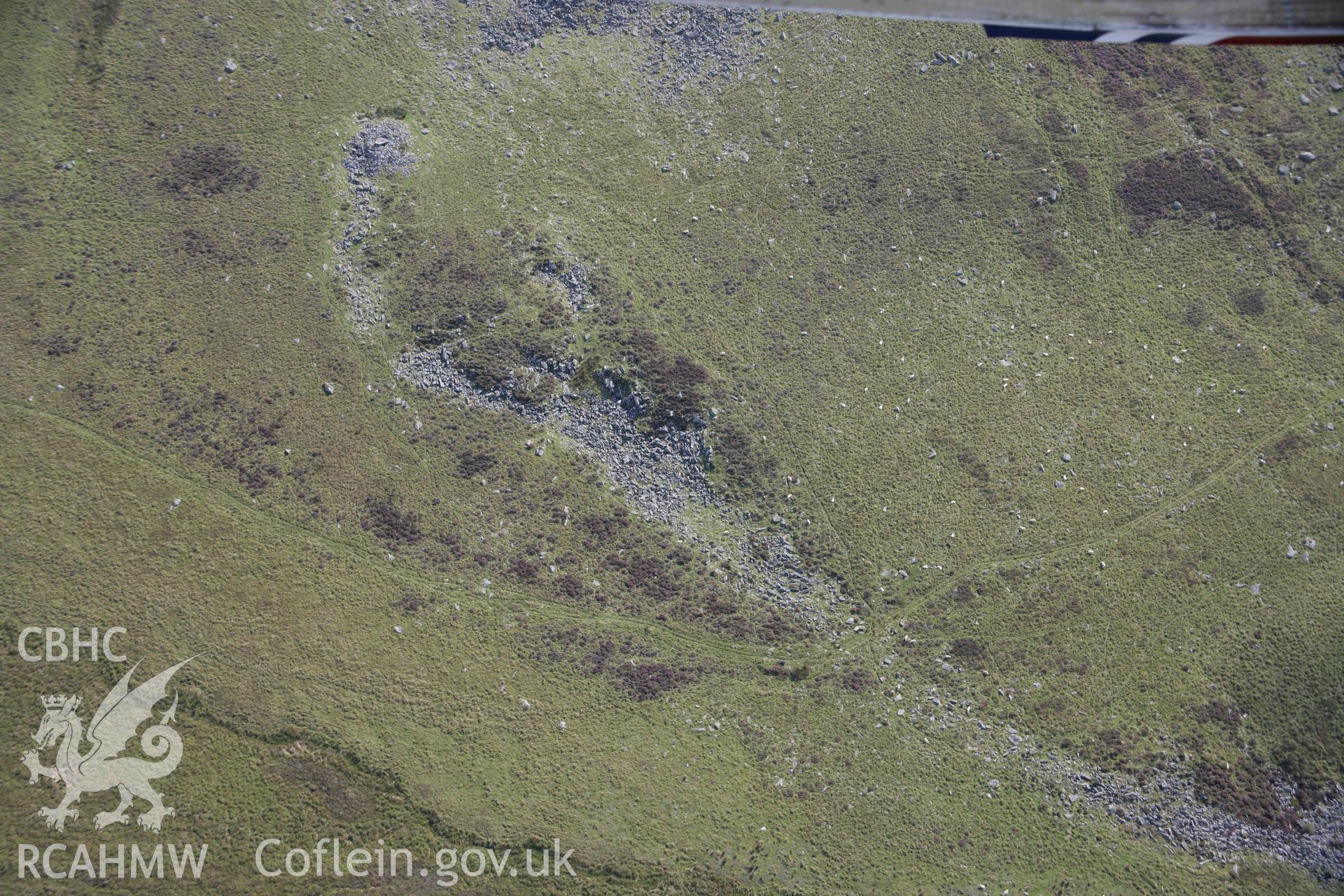 RCAHMW colour oblique photograph of Carn Menyn Cairn, showing 'stone river' below. Taken by Toby Driver on 11/09/2007.