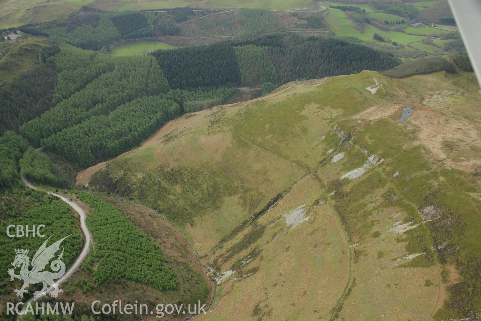 RCAHMW colour oblique aerial photograph of Carn Dolgau. Taken on 17 April 2007 by Toby Driver
