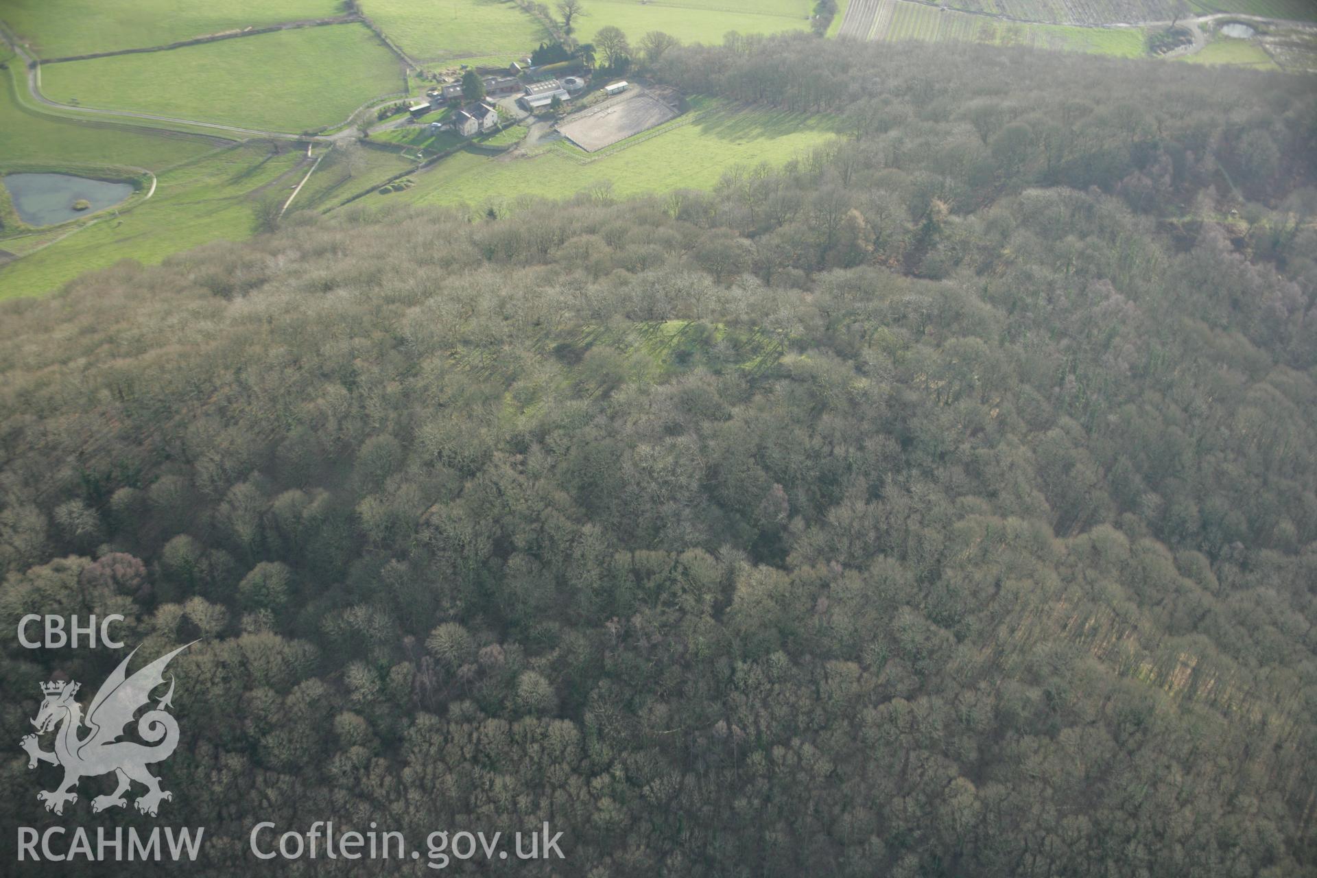 RCAHMW colour oblique aerial photograph of Gaer Fawr, Guilsfield. A landscape view from the west. Taken on 25 January 2007 by Toby Driver