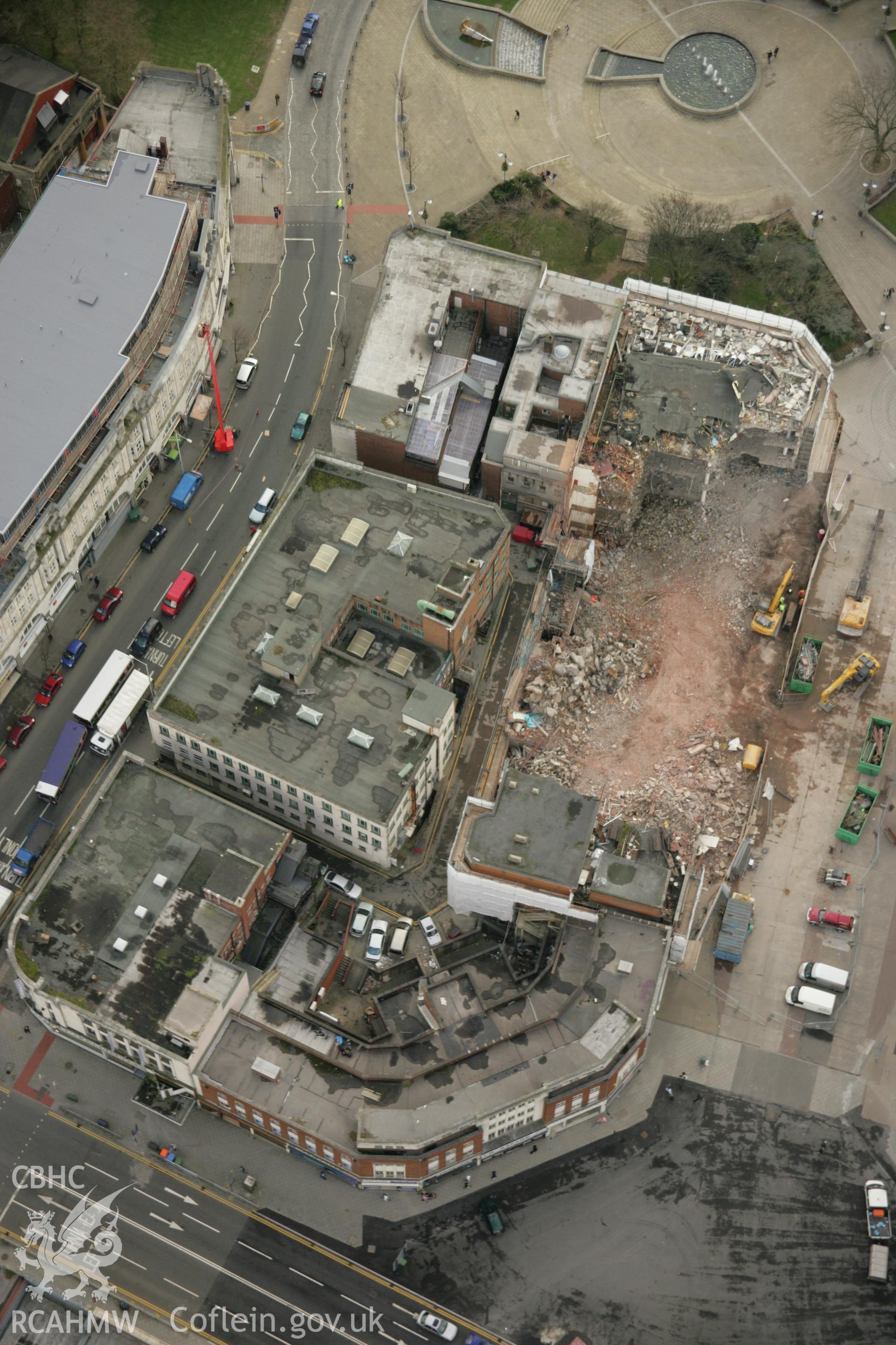 RCAHMW colour oblique aerial photograph of Swansea showing demolition work near the Kingsway Roundabout. Taken on 16 March 2007 by Toby Driver