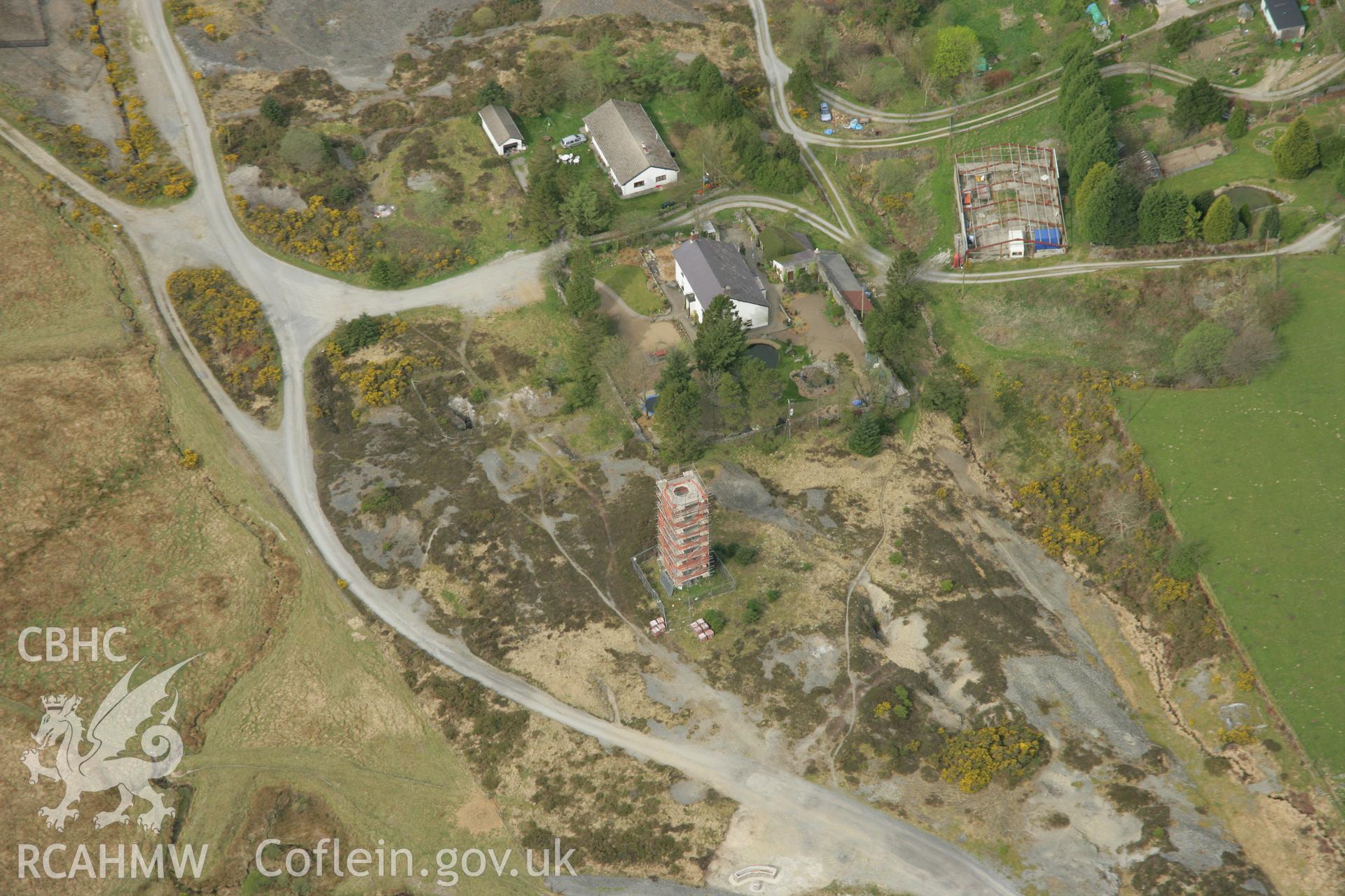 RCAHMW colour oblique aerial photograph of Cwmsymlog Lead Mine. Taken on 17 April 2007 by Toby Driver