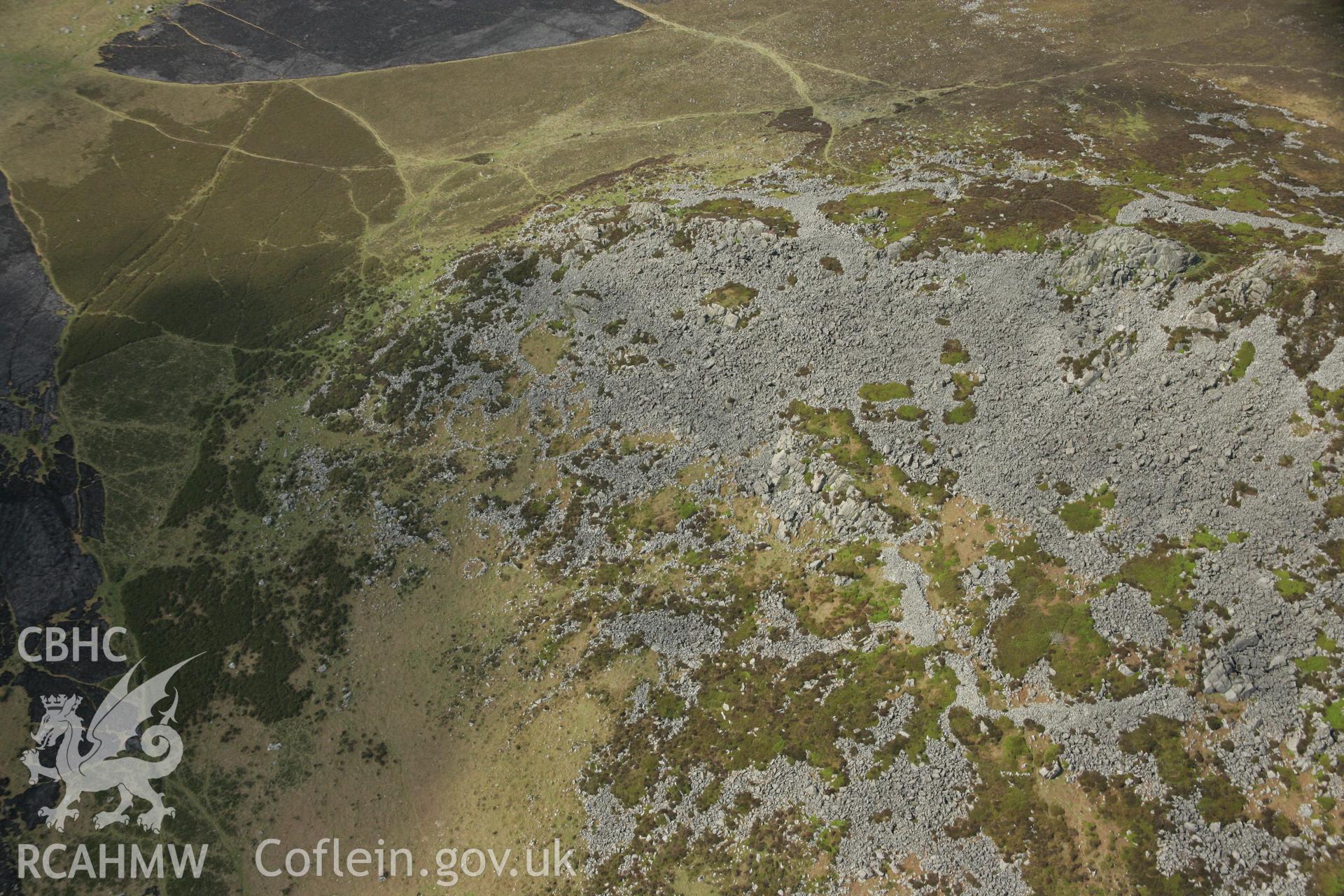 RCAHMW colour oblique aerial photograph of Carn Ingli Camp. Taken on 17 April 2007 by Toby Driver