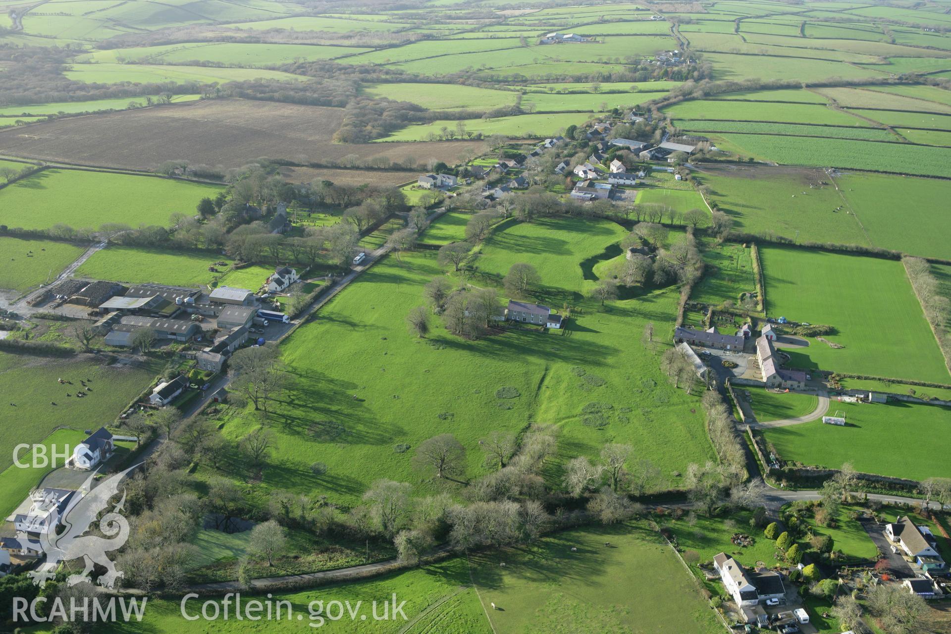 RCAHMW colour oblique photograph of Wiston Castle, and village. Taken by Toby Driver on 29/11/2007.