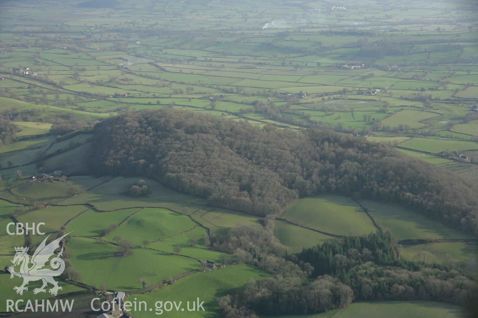 RCAHMW colour oblique aerial photograph of Gaer Fawr, Guilsfiel, and surrounding landscape. Taken on 25 January 2007 by Toby Driver