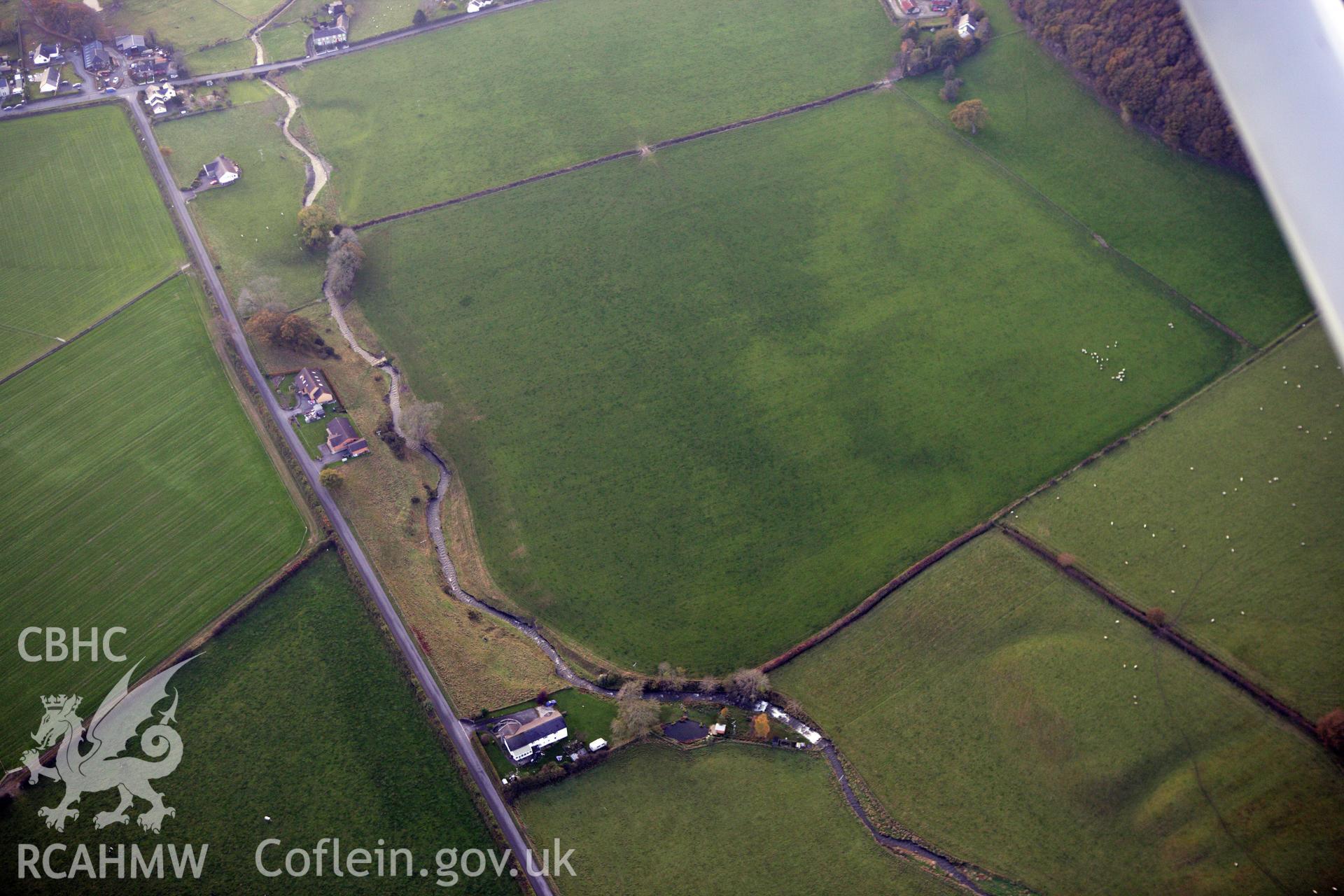 RCAHMW colour oblique aerial photograph of the possible Roman Villa site at Nant Magwr, Abermagwr. Taken on 09 November 2009 by Toby Driver