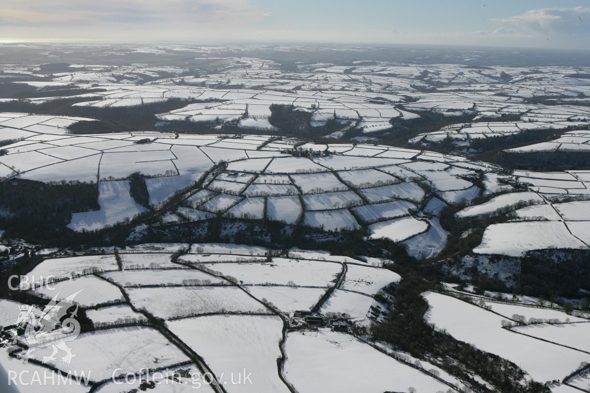 RCAHMW colour oblique photograph of Winter landscape with Llanwinio's parish church in the distance. Taken by Toby Driver on 06/02/2009.