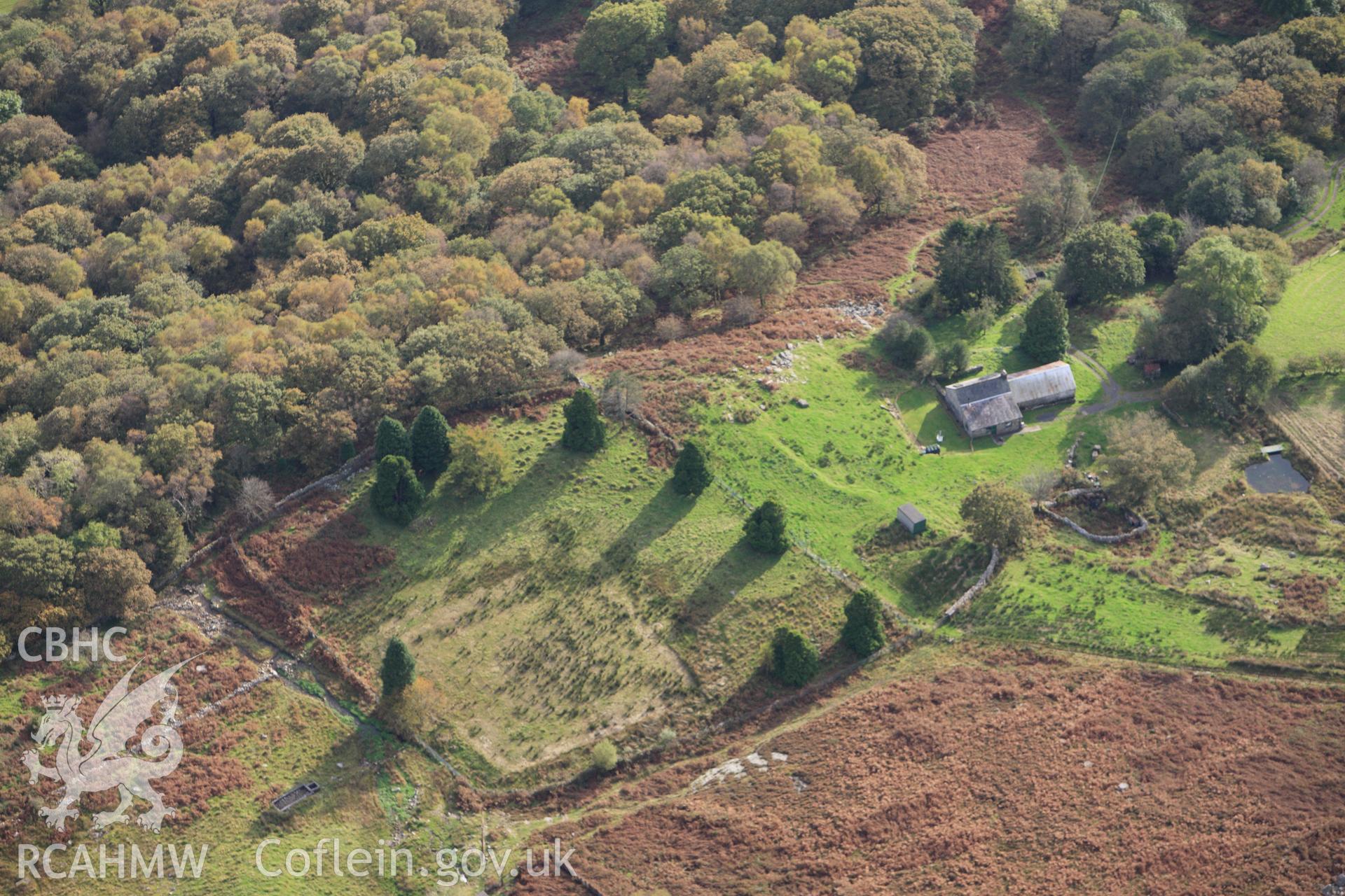 RCAHMW colour oblique aerial photograph of the earthwork enclosure at Garw-Leisiau. Taken on 14 October 2009 by Toby Driver
