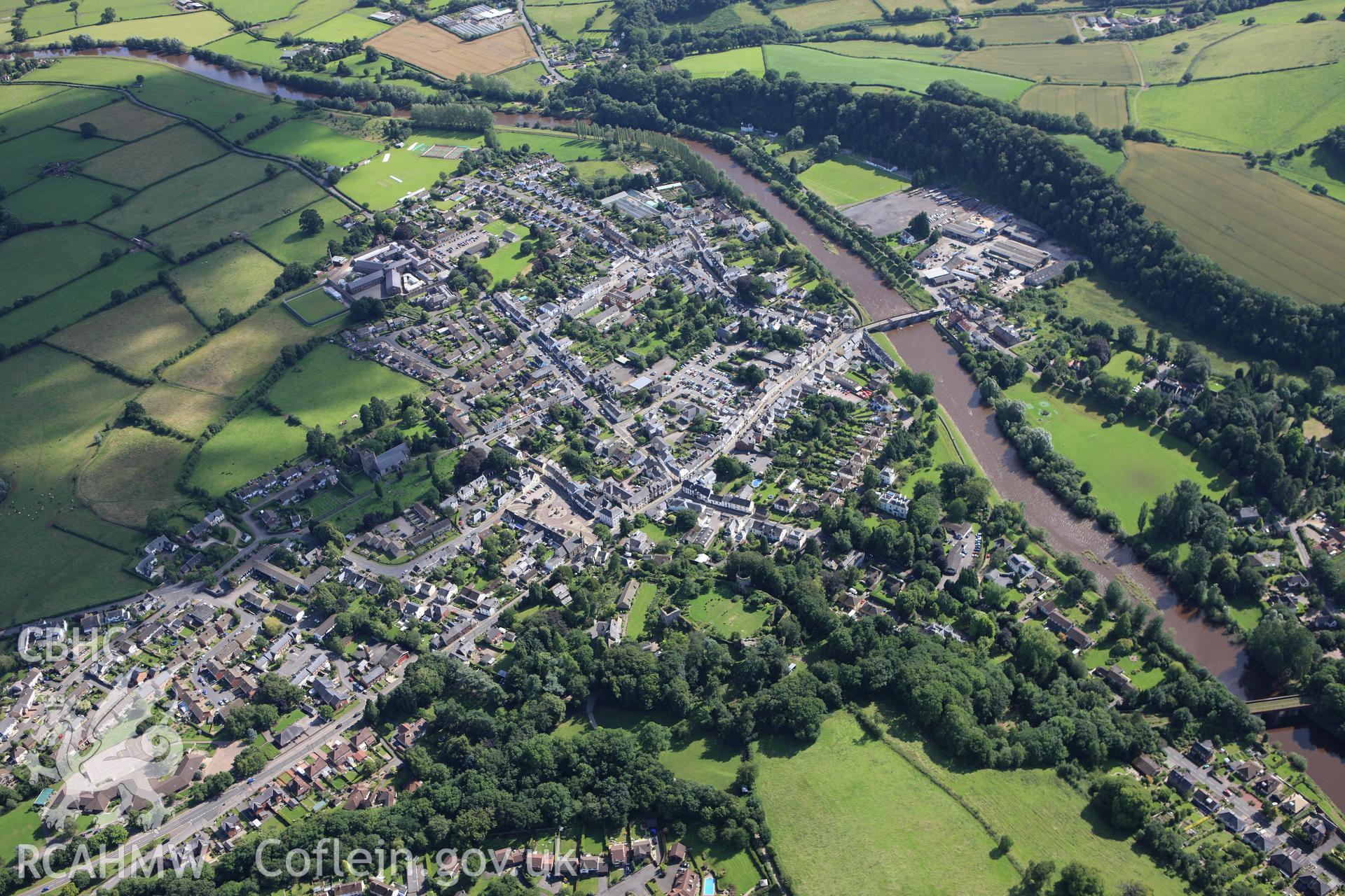 RCAHMW colour oblique aerial photograph of Usk and surrounding landscape. Taken on 23 July 2009 by Toby Driver