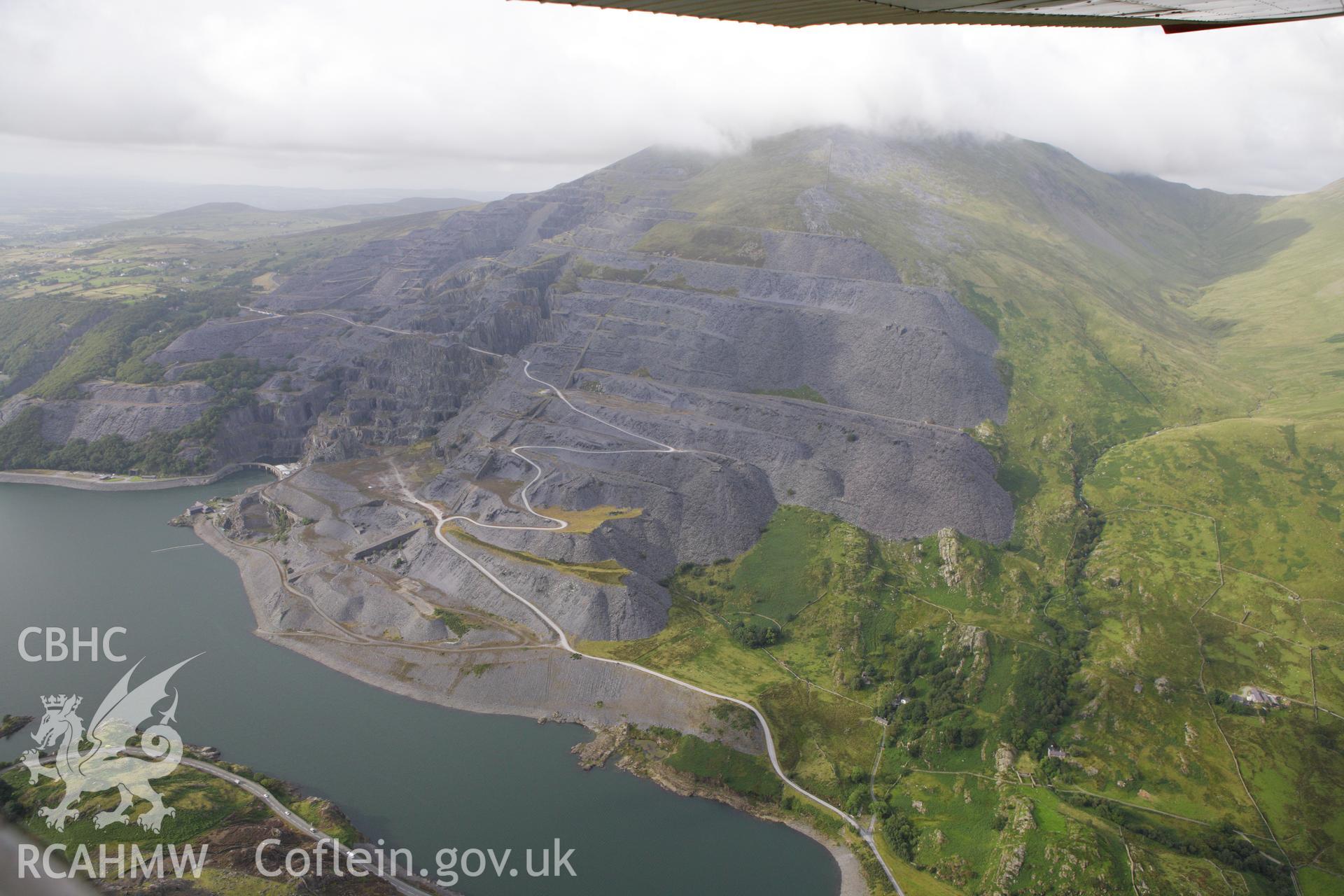 RCAHMW colour oblique aerial photograph of Dinorwic Slate Quarry and Llyn Peris. Taken on 06 August 2009 by Toby Driver