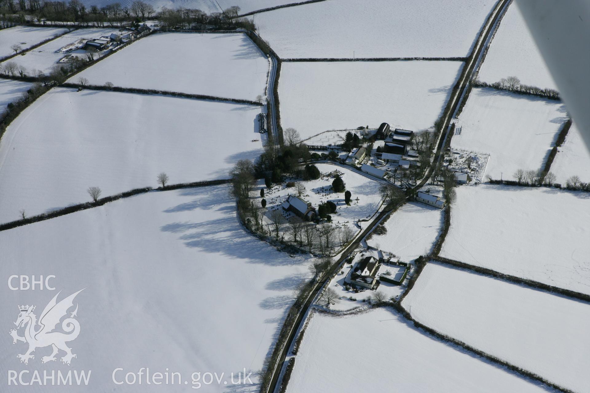 RCAHMW colour oblique photograph of Llanwinio Church, winter landscape. Taken by Toby Driver on 06/02/2009.