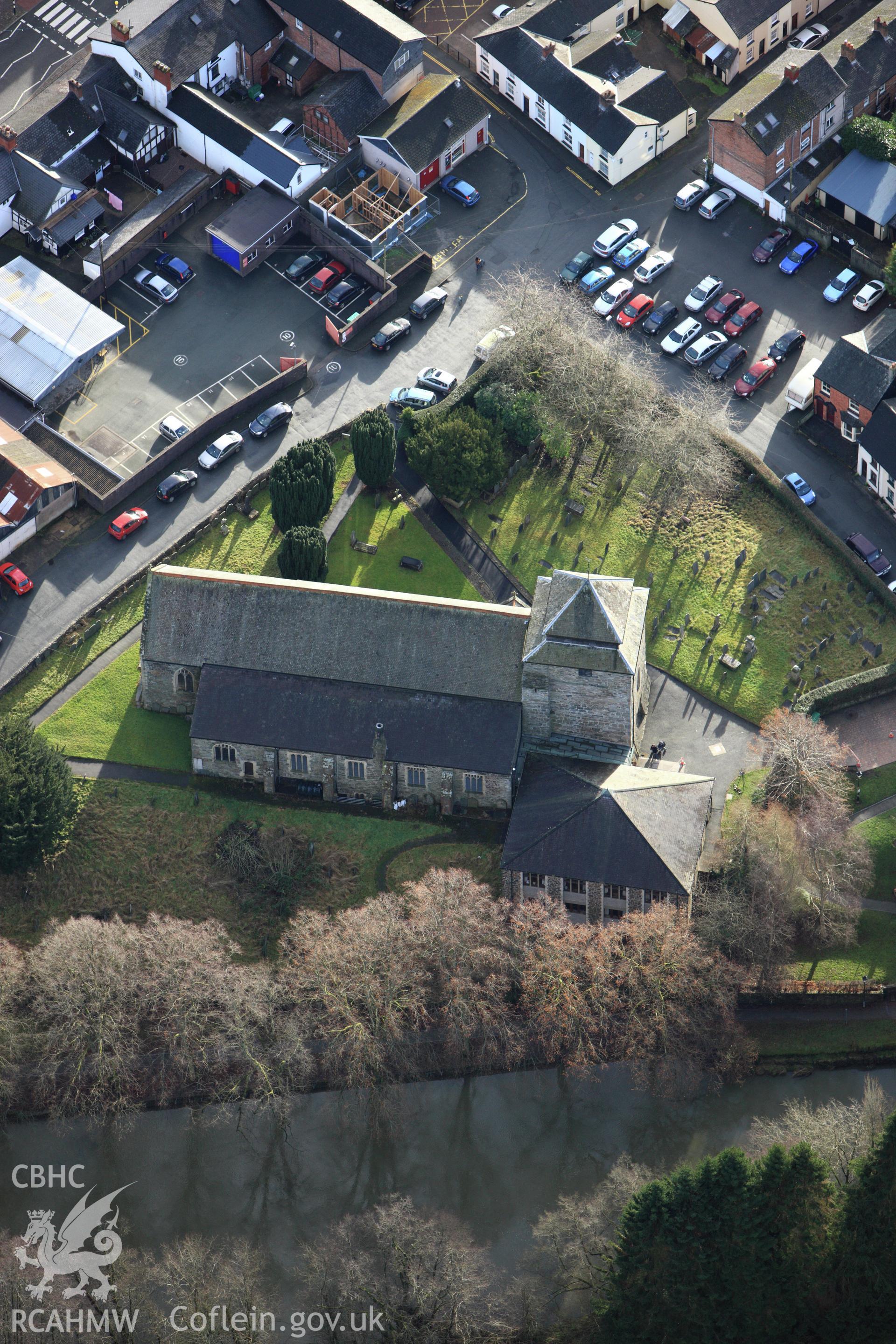 RCAHMW colour oblique aerial photograph of St Idloes' Church, Llanidloes. Taken on 10 December 2009 by Toby Driver