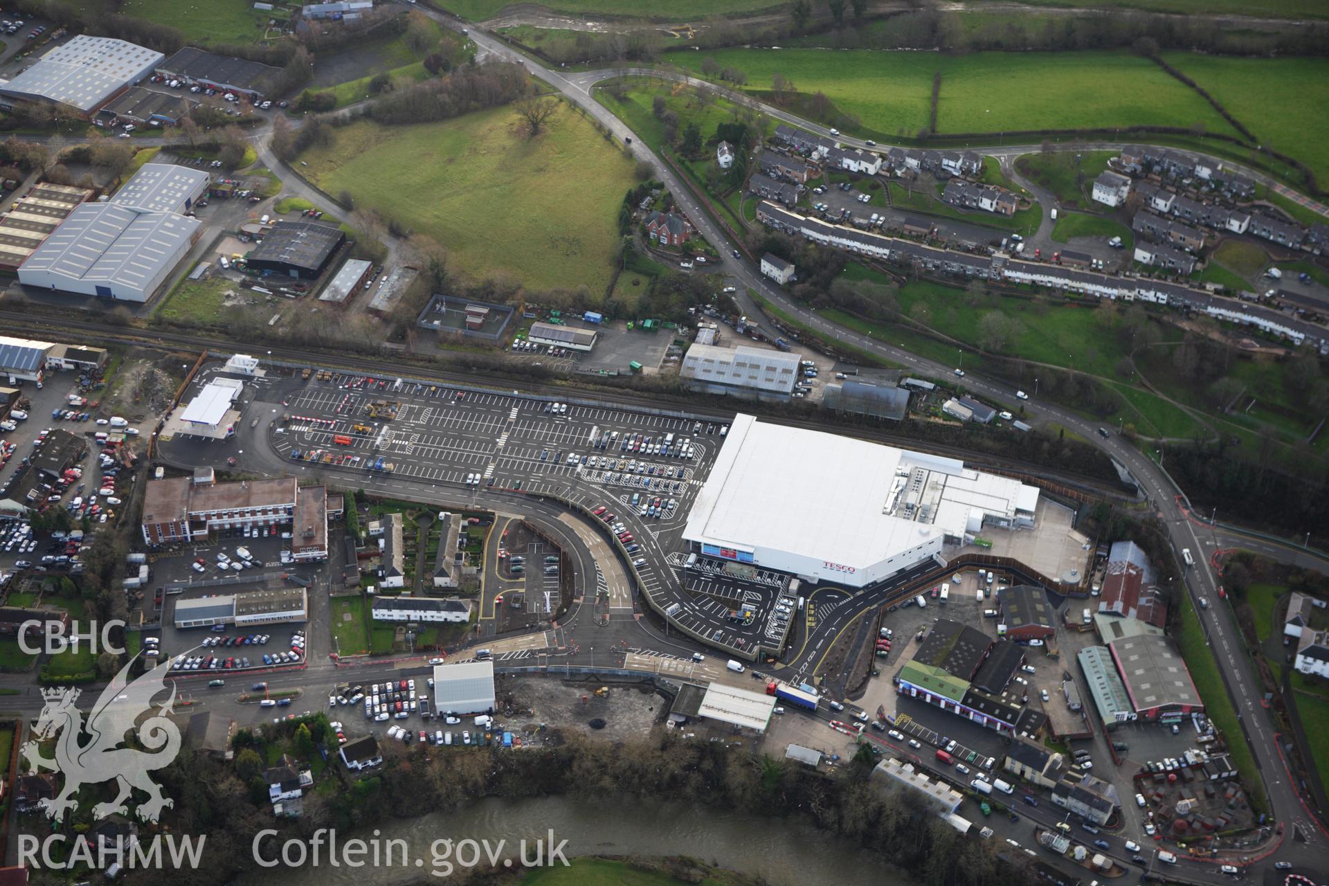 RCAHMW colour oblique aerial photograph of Tesco Store, Pool Road, Newtown. Taken on 10 December 2009 by Toby Driver