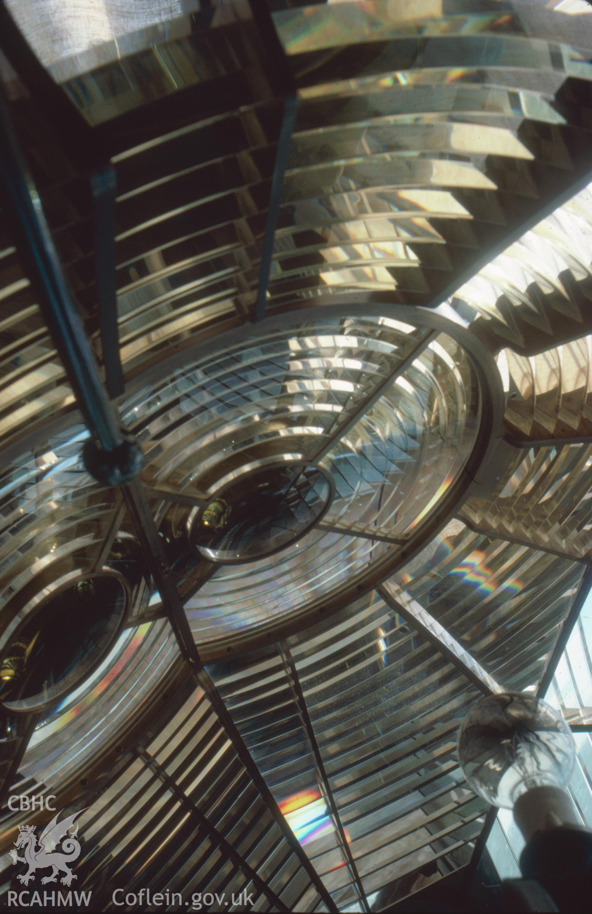 Colour slide, interior view showing lantern optic in the lighthouse.